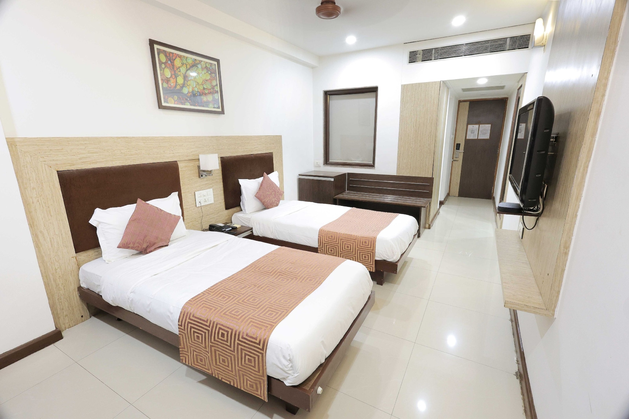 Deluxe Twin Bed at Palette Hotel Surya Vadodara