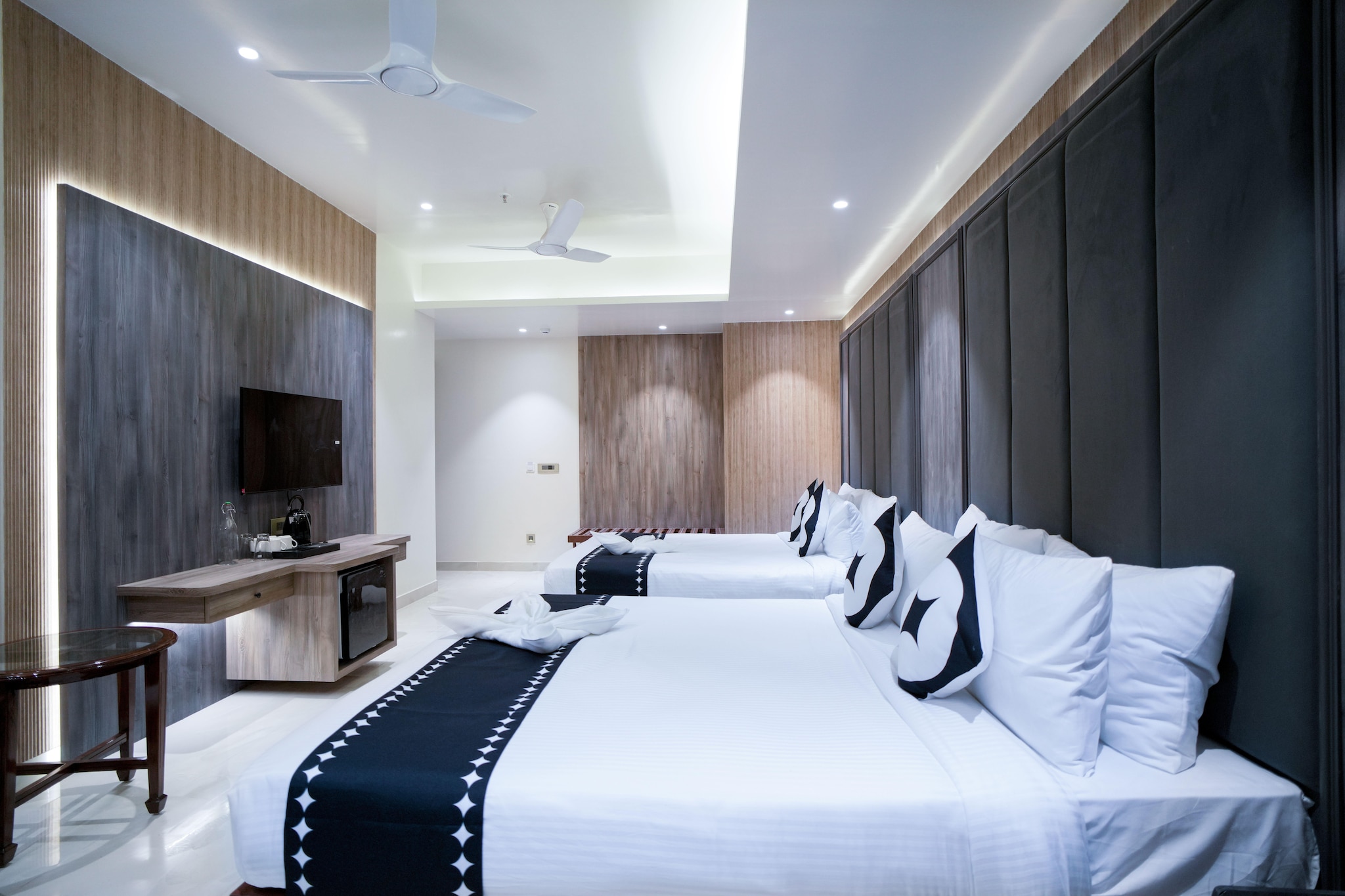 A Spiritual Abode
Welcome to Premium Family Escape at Clubhouse Hotel Ayodhya, a modern retreat offering a seamless blend of comfort and convenience in the spiritual heart of India. Strategically located just 1.5 km from Ayodhya Railway Station and 6 km from Ayodhya International Airport, the property ensures ease of access for travelers.
Accommodation
Choose from a range of thoughtfully designed accommodations. Each is equipped with modern amenities like high-speed Wi-Fi, LED TVs, and tea/coffee makers.
Deluxe Rooms - 250 sq.ft.
Perfect for value-seeking travelers who want a comfortable stay
Executive Rooms (Twin bed) - 300 sq.ft.
Rooms with separate single beds for individual comfort
Executive Rooms (King bed) - 330 sq.ft.
Larger rooms for extra convenience
Family Rooms - 410 sq.ft.
Extra space for those traveling with family
Dining
Dine at the rooftop All Day Dining restaurant, where a multi-cuisine menu awaits, offering everything from Indian delicacies to global flavors. With its serene ambiance and capacity to seat 45 guests, itâ€™s the perfect spot to enjoy a delicious meal curated by expert chefs.
Things To Explore
Discover nearby attractions such as Ram Mandir, Guptar Ghat, and Surya Kund, or simply get pampered with the property's premium services, including concierge services and welcoming guest experiences like a refreshing drink upon arrival.
At Premium Family Escape at Clubhouse Hotel Ayodhya, every detail is designed to create a memorable stay, blending the rich cultural heritage of Ayodhya with modern hospitality.

Unmarried couples are warmly welcome at this property.
Guests with local ID proof are warmly welcome.
Early Check-In Policy: A full dayâ€™s room rate will be charged for check-ins before 6:00 AM. Complimentary early check-in is available between 6:00 AM and 10:00 AM, subject to room availability.
Check-in is only available to guests aged 18 and above. Please provide a government-issued ID to confirmÂ yourÂ age.
