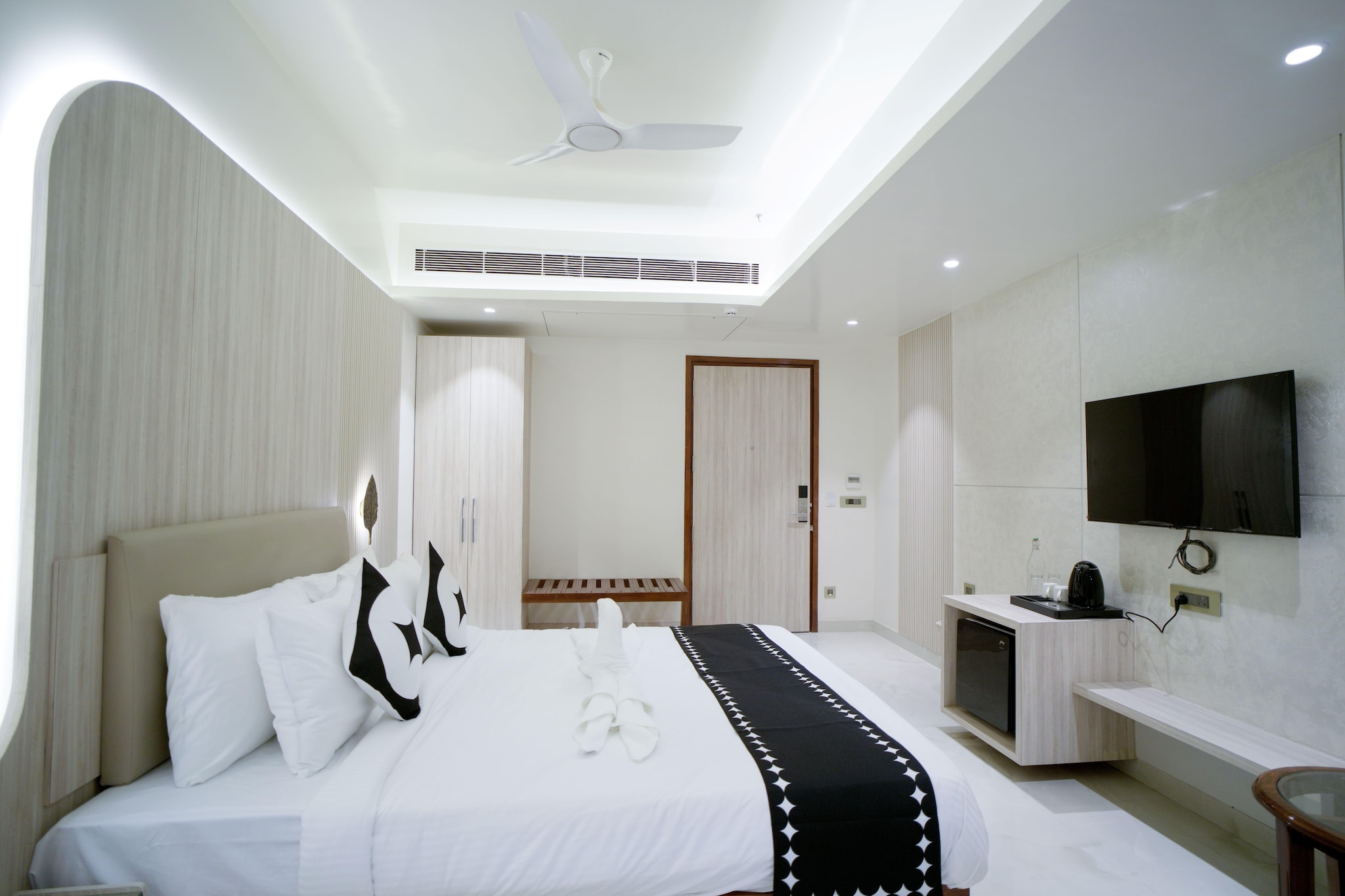 A Spiritual Abode
Welcome to Premium King Room at Clubhouse Hotel Ayodhya, a modern retreat offering a seamless blend of comfort and convenience in the spiritual heart of India. Strategically located just 1.5 km from Ayodhya Railway Station and 6 km from Ayodhya International Airport, the property ensures ease of access for travelers.
Accommodation
Choose from a range of thoughtfully designed accommodations. Each is equipped with modern amenities like high-speed Wi-Fi, LED TVs, and tea/coffee makers.
Deluxe Rooms - 250 sq.ft.
Perfect for value-seeking travelers who want a comfortable stay
Executive Rooms (Twin bed) - 300 sq.ft.
Rooms with separate single beds for individual comfort
Executive Rooms (King bed) - 330 sq.ft.
Larger rooms for extra convenience
Family Rooms - 410 sq.ft.
Extra space for those traveling with family
Dining
Dine at the rooftop All Day Dining restaurant, where a multi-cuisine menu awaits, offering everything from Indian delicacies to global flavors. With its serene ambiance and capacity to seat 45 guests, it’s the perfect spot to enjoy a delicious meal curated by expert chefs.
Things To Explore
Discover nearby attractions such as Ram Mandir, Guptar Ghat, and Surya Kund, or simply get pampered with the property's premium services, including concierge services and welcoming guest experiences like a refreshing drink upon arrival.
At Premium King Room at Clubhouse Hotel Ayodhya, every detail is designed to create a memorable stay, blending the rich cultural heritage of Ayodhya with modern hospitality.

Unmarried couples are warmly welcome at this property.
Guests with local ID proof are warmly welcome.
Early Check-In Policy: A full day’s room rate will be charged for check-ins before 6:00 AM. Complimentary early check-in is available between 6:00 AM and 10:00 AM, subject to room availability.
Check-in is only available to guests aged 18 and above. Please provide a government-issued ID to confirm your age.
