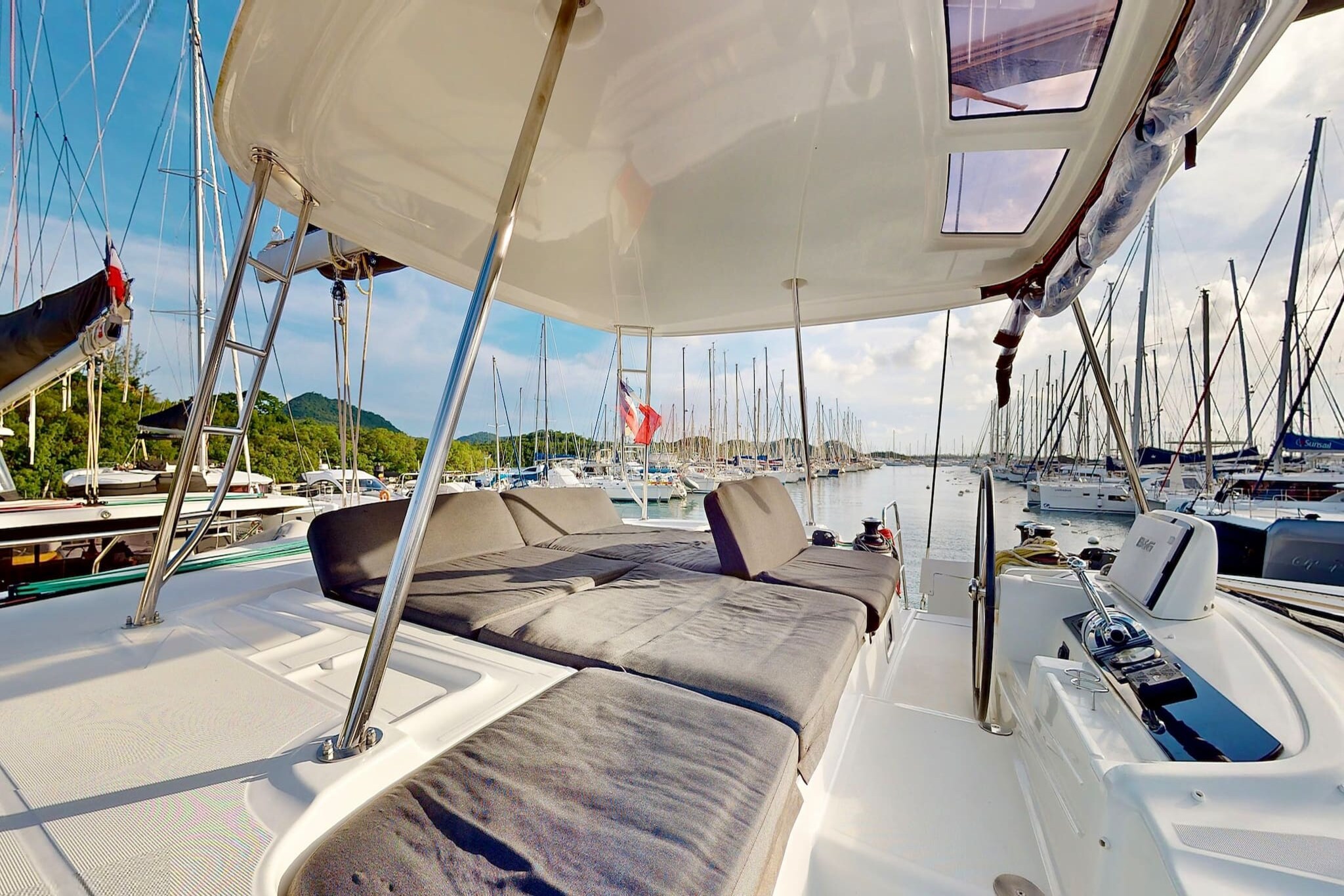 Set sail on a private, all-inclusive catamaran experience where luxury, comfort, and freedom meet. With a professional skipper at the helm and a dedicated hostess-cook preparing delicious meals and drinks, your only task is to unwind and soak in the Caribbean magic. Whether you’re lounging on the sun-drenched deck, savoring gourmet dishes, or swimming in turquoise waters, every moment is curated for relaxation and wonder.

Le 46, your floating has spacious indoor and outdoor lounges, a flybridge with panoramic views, and easy sea access via a tenderlift platform transform the boat into your personal island of serenity. Inside, elegantly furnished cabins with island beds, ample light, and seamless indoor-outdoor flow ensure 5-star comfort throughout your journey.

This is more than a holiday—it’s a complete change of scenery. Glide over the waves with a performance-optimized sail system, enjoy unforgettable sunsets from the bow, and let the wind guide you to hidden coves and coastal gems. Everything is included except the crew cabin, and if needed, JB Voyage Concierge can source equivalent luxury yachts via trusted partners like SamBoat, Sunsail, or RM Cruises. Your dream voyage starts here—book now and embrace the sea in style.
