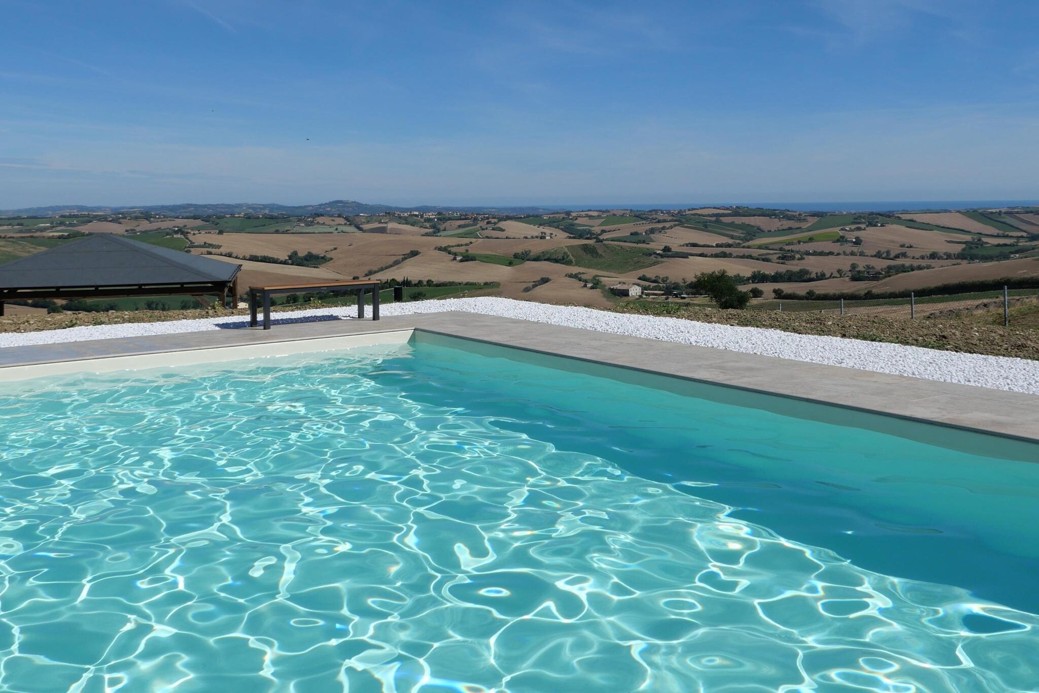 This idyllic apartment is located in a sunny location on a fenced 5,000 m² dream property with panoramic views of the sea and the hills, surrounded by olive trees. The hills of the Marche region and the picturesque surroundings offer a variety of leisure activities to suit every interest.
Whether you enjoy sporting activities or are looking for moments of relaxation, you'll find something to suit every taste.
Sports enthusiasts can enjoy hiking, exciting bike rides, or peaceful strolls through the unique Marche landscape. For those who prefer the sea, the beach of Torrette di Fano is just a 20-minute drive away. If, on the other hand, you want to admire the wild nature of the Conero, we recommend a visit to Due Sorelle beach in Sirolo, considered one of the most beautiful bays in Italy.
Highlights included: Final cleaning, all consumption-based energy costs, linen package, 18x8m pool, Wi-Fi (2 mountain bikes).
Note: Dogs and other pets are not allowed.