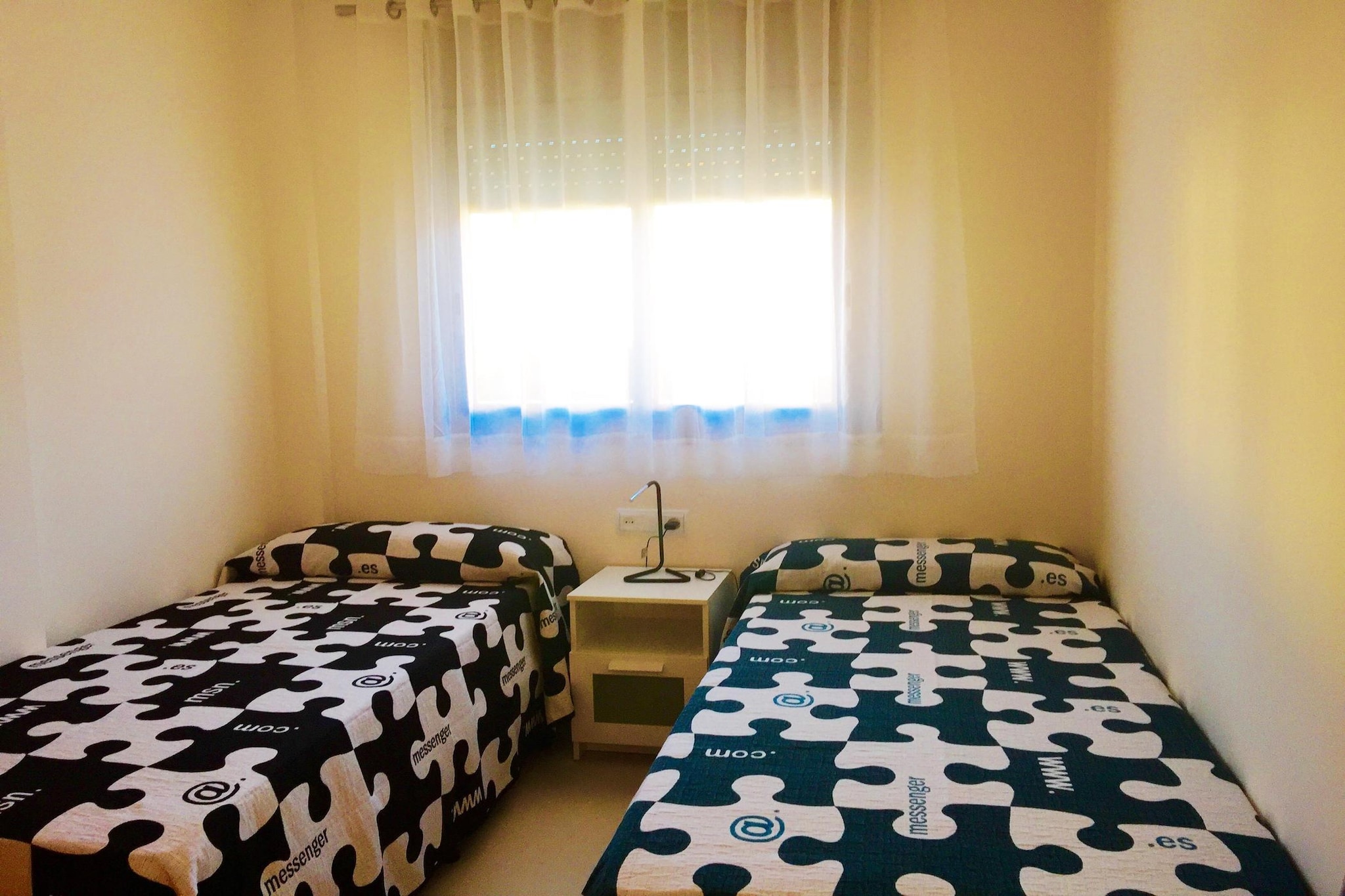 Elevator, Kitchen(toaster, coffee machine, oven, microwave, dishwasher, fridge, freezer, Juicer, dishes and cutlery), Living/diningroom(TV, dining table, seating area), bedroom(single bed, single bed), bedroom(double bed), bathroom(bath tub), Children pool, Garden Furniture , washing machine, balcony, air conditioning, parking, iron