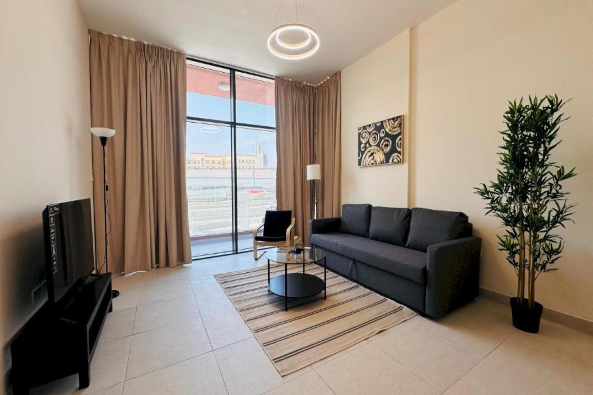 Experience ultimate comfort and luxury at Cozy 2BR Retreat with Pool Access in JLT, located along the prestigious Sheikh Zayed Road, near JLT. Perfect for families, couples, or business travelers, our spacious two-bedroom apartment offers a home-like atmosphere with a touch of elegance. Relax in the expansive living space, enjoy modern amenities, and take in the breathtaking city views. Make your Dubai getaway truly unforgettable by booking your stay at our prime location today!

Prime Location: Conveniently located just 30 km from Al Maktoum International Airport, the apartment is within easy reach of popular attractions like The Montgomerie, The Walk at JBR, and the iconic Burj Al Arab Tower. Guests appreciate the central location and exceptional comfort.  

Exceptional Facilities: Enjoy top-notch amenities, including a rooftop swimming pool and a spacious terrace with breathtaking views. Stay connected with complimentary WiFi and maintain your workout routine in the fitness room. Additional conveniences include a lift, family rooms, luggage storage, and free parking for all guests.