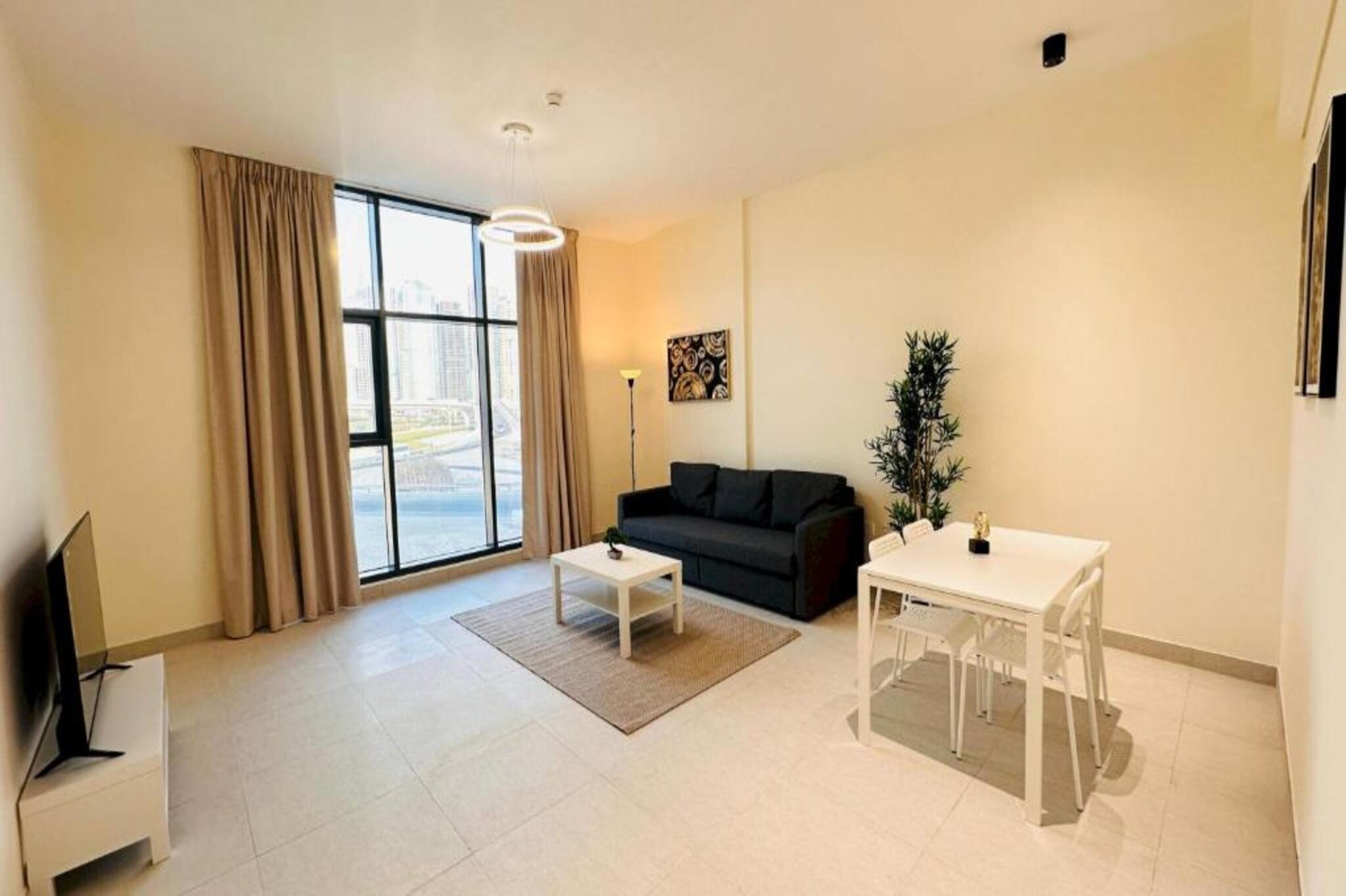 Experience comfort and elegance at Modern 1BR Apartment in JLT, conveniently located near Sheikh Zayed Road. Perfect for solo travelers, couples, or business visitors, our stylish one-bedroom apartment offers a luxurious stay with all essential amenities. Take in the stunning city views and enjoy the ease of a prime location. Book your stay now for an unforgettable Dubai experience! Comfortable Living: Enjoy a spacious, air-conditioned apartment with a private bathroom and contemporary furnishings. Step out to the outdoor seating area or admire the serene inner courtyard views.

Prime Location:
- Just 30 km from Al Maktoum International Airport
- Close to popular attractions like The Montgomerie, The Walk at JBR, and the iconic Burj Al Arab Tower
- Convenient access to public transport and major landmarks

Exceptional Amenities:
- Rooftop Swimming Pool – Take a refreshing dip while enjoying the skyline view
- Fitness Room – Stay active with access to our well-equipped gym
- Free WiFi – Stay connected throughout your stay

Book now and create unforgettable memories at Spacious 1 BR at JLT W/ Rooftop Pool and Gym!