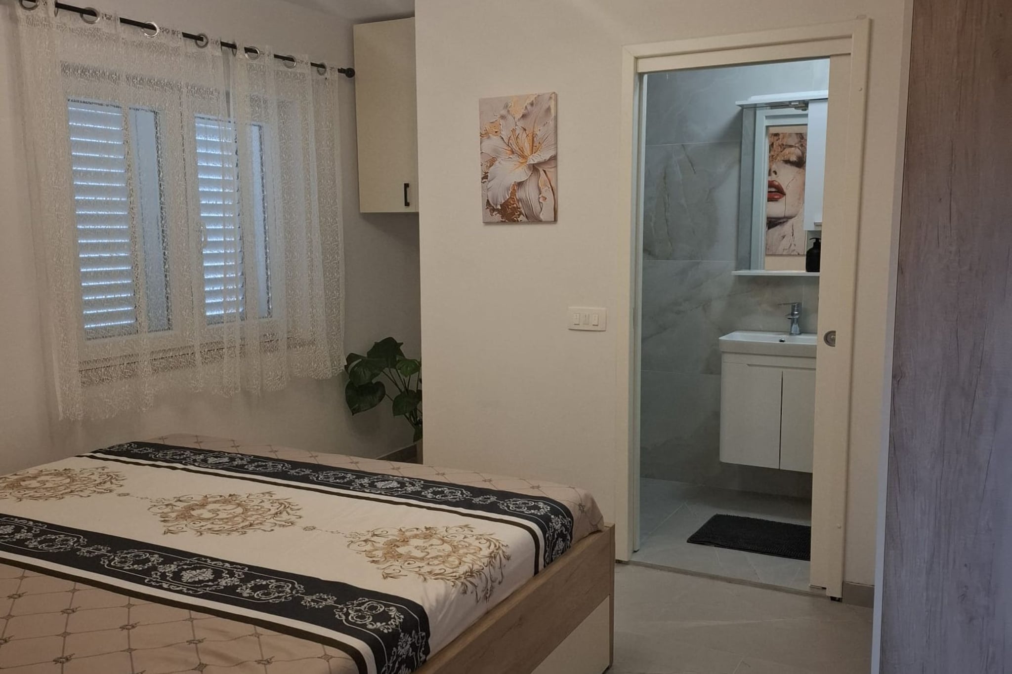 Apartment Jakić - One Bedroom Apartment with Garden View-Bedroom