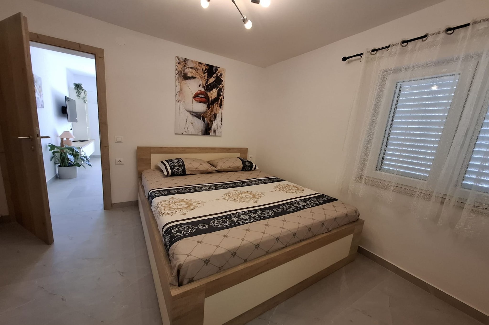 Apartment Jakić - One Bedroom Apartment with Garden View-Bedroom