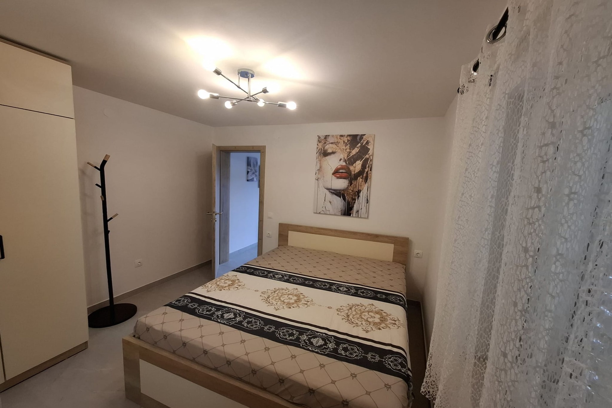 Apartment Jakić - One Bedroom Apartment with Garden View-Bedroom
