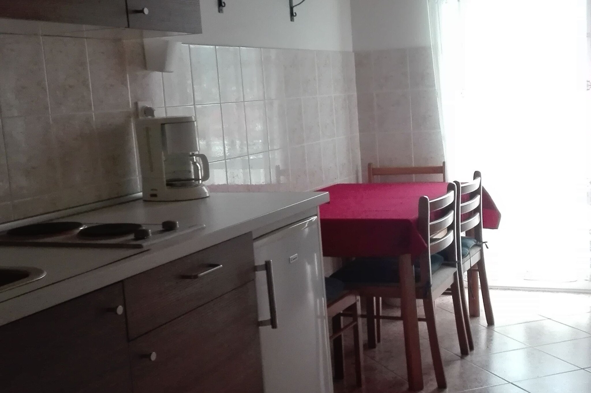 Villa Mery offers a bright, generously sized residence with sea views, modern comfort, and great outdoor amenities. Its unbeatable proximity to both beach and historic Rab makes it an excellent choice for families or small groups seeking a seaside base.

Note:
Private parking is available, and a reservation is not required.
Baggage drop-off is available before check-in.
Wi-Fi is available throughout the property.
Pets are allowed. 
Property is pet-friendly.
A Baby cot is available on request.

This two-bedroom can accommodate up to four guests. It features an SAT/cable TV and is combined with a seating area and kitchen. The private bathroom is equipped with a shower and toilet.

Thanks to its excellent location, everything you'll need for your vacation is just a short walk from the property. Grocery stores, cafes, restaurantsâ€”everything is within a 250 m radius. The beach is 250 m away from the property.

The airport is 50 km away from the property.