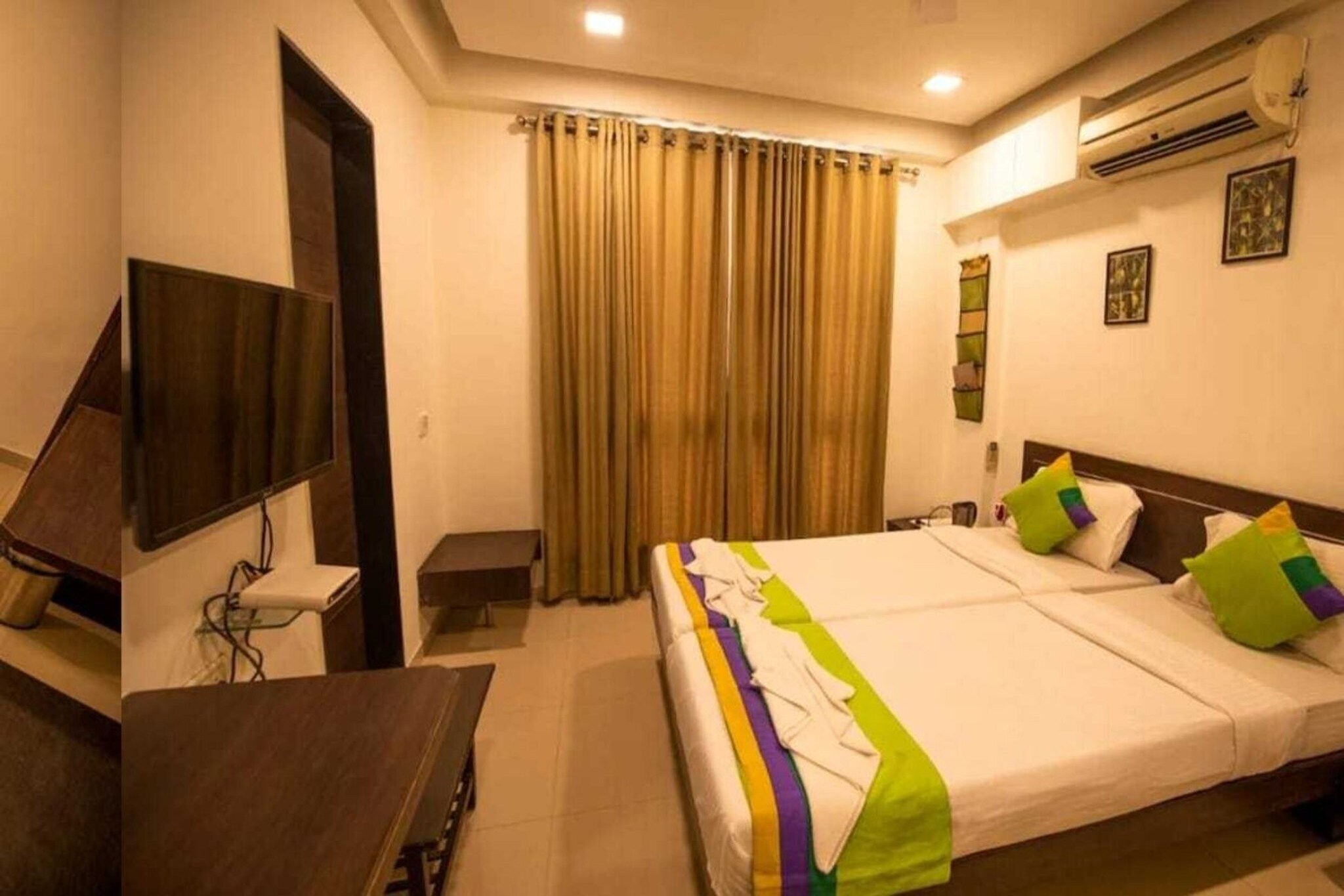 Comfortable Accommodations: Collection O Mandvi Bus Terminal Formerly Hotel Shraddha in Bhuj offers family rooms with air-conditioning, private bathrooms, and free WiFi. Each room includes a work desk, seating area, TV, and free toiletries.
Convenient Facilities: Guests benefit from a lift, 24-hour front desk, housekeeping service, room service, and luggage storage. The hotel provides free toiletries, bath or shower, tiled floors, and wardrobes for added comfort.
Prime Location: Located in Mandvi, the hotel is situated in Lakda Bazar Lakda Bazaar, Rameshwar Colony. Reception staff speak Hindi, ensuring smooth communication for all guests.
Early Check-In Policy: A full day’s room rate will be charged for check-ins before 6:00 AM. Complimentary early check-in is available between 6:00 AM and 10:00 AM, subject to room availability.
Check-in is only available to guests aged 18 and above. Please provide a government-issued ID to confirm your age.