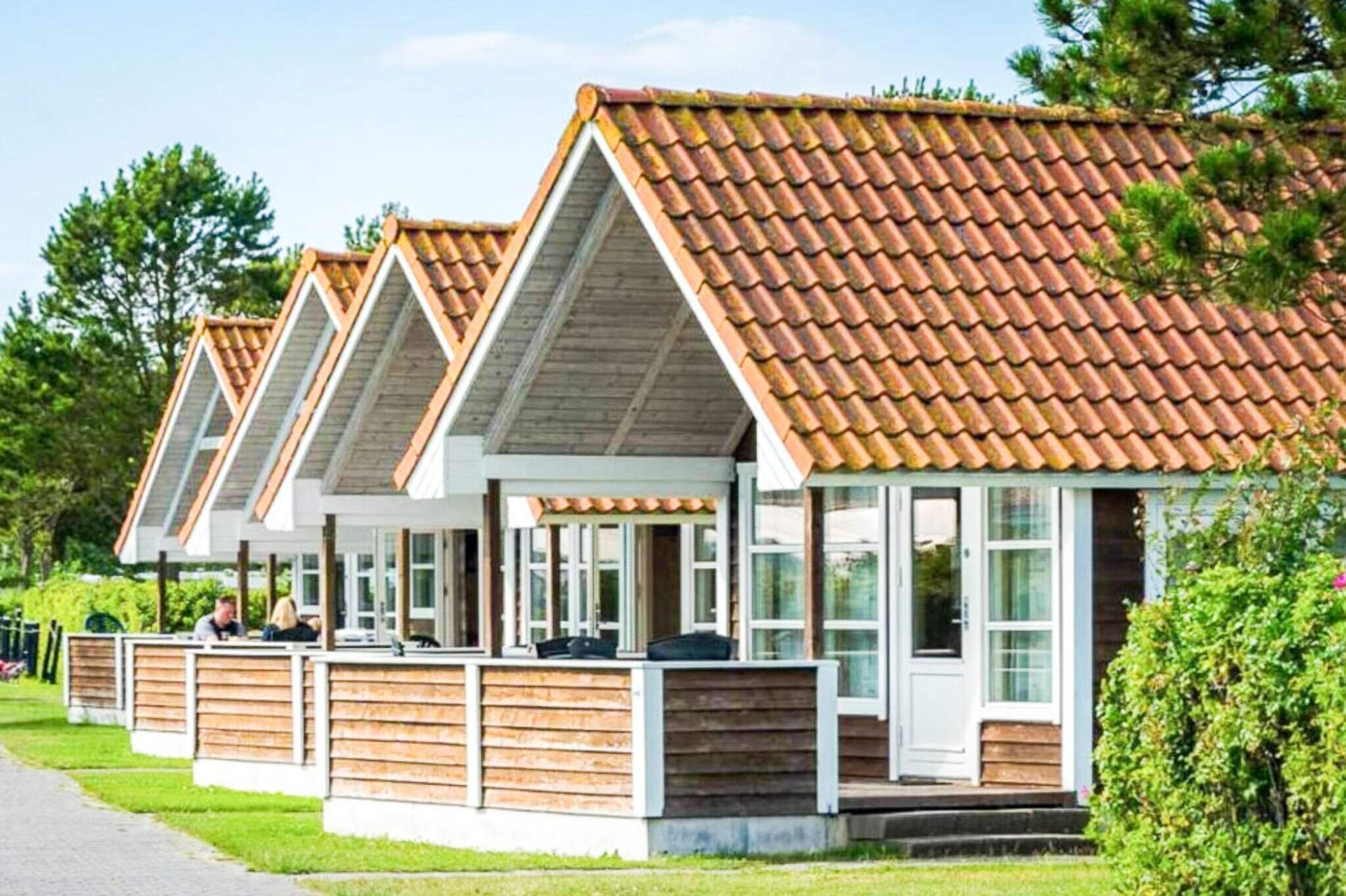 Camping in the Heart of Nature and City Life: Welcome to First Camp Bogense City – Funen, where you can enjoy the perfect blend of nature and city life. Located just a five-minute walk from the harbor, beach, marina, and city center, our campsite offers easy access to a variety of shops, restaurants, and supermarkets, as well as beautiful natural surroundings. Whether you prefer relaxing in nature or exploring the city streets, Bogense provides the best of both worlds.   Comfortable and Fully Equipped Accommodation: Our 25m² camping cabins are designed with your comfort in mind, fully furnished to accommodate up to 6 people. Each cabin comes equipped with its own kitchen and toilet, making it the perfect home away from home for your family holiday. Relax and create unforgettable memories in a cozy and well-appointed cabin that makes every day of your stay easy and enjoyable.   Free Access to Outdoor Pool: As a guest at First Camp Bogense, you’ll enjoy free access to our outdoor pool, included in the price of your stay. Whether you're swimming for fun or relaxing by the water, our pool is a perfect way to cool off and unwind. Please note that safety is a priority, and access may be restricted if deemed unsafe. Opening hours may vary, so be sure to check for the most up-to-date information.   Convenience at the Shop: Stop by our shop for everything you need to make your camping holiday even more enjoyable. From cold drinks and toys for the little ones to coffee for the early risers, we’ve got you covered. Craving something sweet or need a few batteries? We've got that too! Let us tempt you with delicious ice cream, fun sweets, and all the small necessities you might not have known you were missing.   Easy Booking and Reservations: We always recommend making reservations in advance, but don’t worry – we’re happy to accept drop-in guests! Just keep in mind that while we do our best to accommodate everyone, we cannot always guarantee availability without a reservation. Be sure to book early to ensure the best experience during your stay!