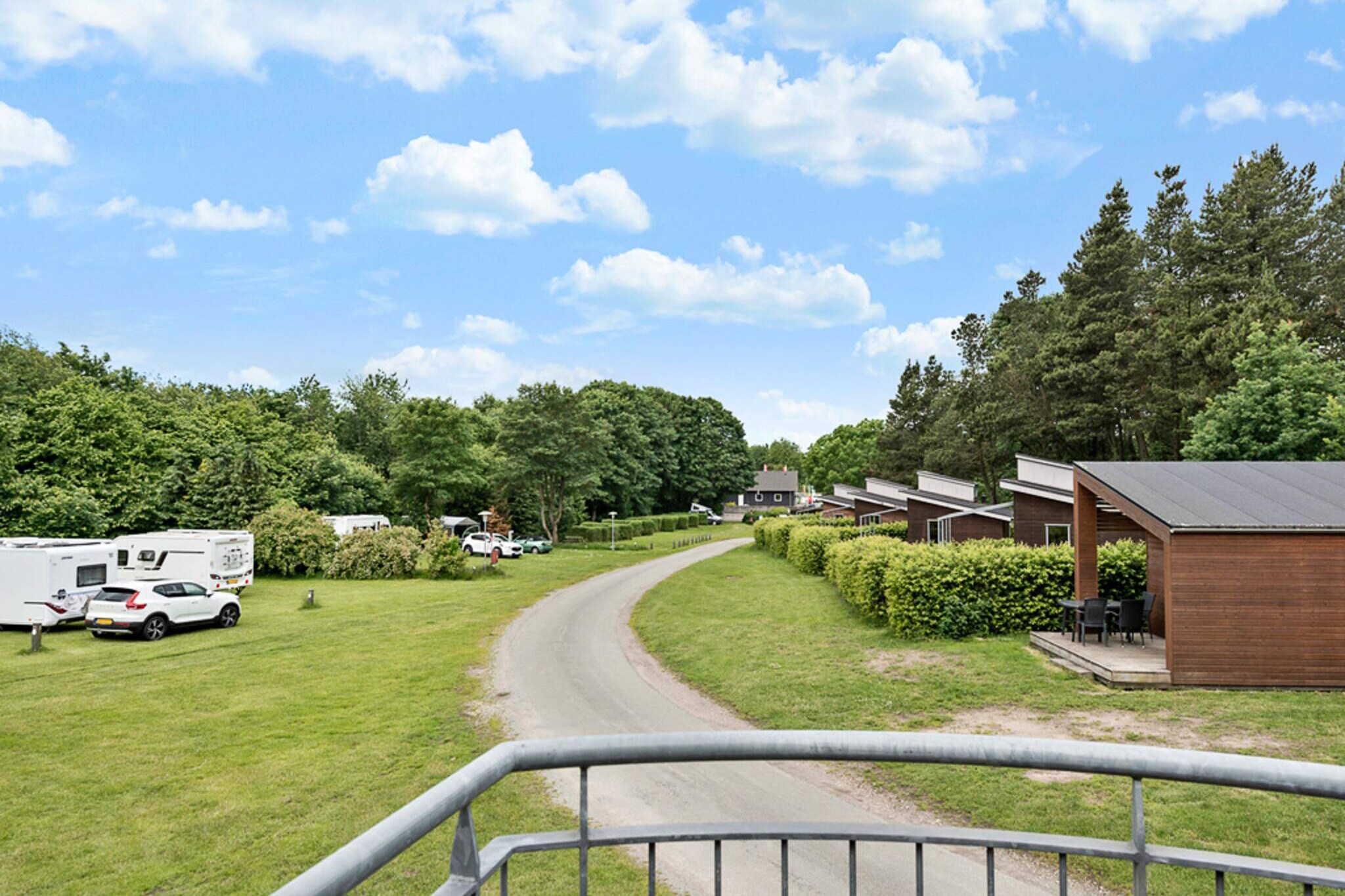 Close to the big city and yet in the middle of nature Aarhus is the ideal location for those seeking a relaxing retreat surrounded by nature while having easy access to the vibrant city life. Nestled in a beautiful, hilly natural area, the campsite offers guests a tranquil atmosphere, perfect for unwinding and reconnecting with nature. Whether you enjoy hiking through lush greenery, cycling along scenic trails, or simply relaxing in the peaceful environment, Aarhus provides the best of both worlds – nature and city attractions just minutes away. Features: Electric Car Charging Stations: Convenient charging points for electric vehicle owners. Free Surfing Zone: Stay connected with free internet access throughout the site. Activities: Playground: The campsite features a well-equipped playground that includes a pirate ship, climbing frames, slides, and small houses for imaginative play. It’s a perfect place for kids to enjoy while parents relax nearby. Bouncy Cushion: Kids and adults alike will have fun on our giant bouncy cushion! A perfect spot for jumping around and enjoying some active fun. (Children should be accompanied by an adult for safety.) Giant Chessboard: For families looking to enjoy some friendly competition, the large chessboard on-site provides a unique way to introduce children to chess while engaging in outdoor fun. Nearby Attractions: Aarhus is easily accessible by bus, light rail, bicycle, or car, making it perfect for those who want to experience the excitement of the city without being far from nature. In Aarhus, families can visit a range of attractions like Djurs Sommerland with over 60 rides, Legelandet offering 5000m² of bouncy castles, trampolines, and slides, or the Jysk Trotting Track for those interested in horses and trotting races. Pet-Friendly: Bring your furry friends along! Pets, including dogs and cats, are welcome in all cabins, ensuring that your whole family can join in on the fun. Whether you prefer a quiet day exploring the surrounding nature, playing games with the family, or visiting nearby attractions, Aarhus offers something for everyone. With options for caravans, tents, motorhomes, and glamping, it’s an ideal destination for both adventure and relaxation.