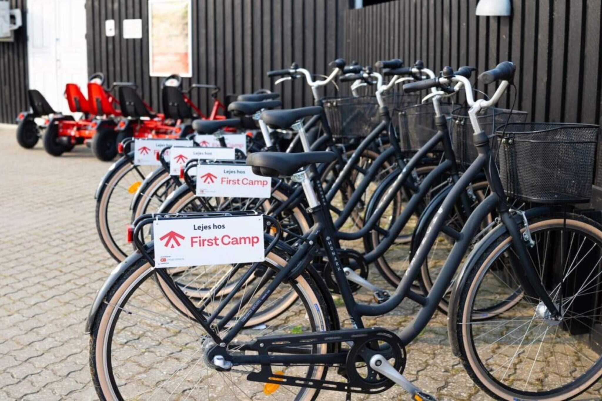 Welcome to First Camp HolbÃ¦k Fjord, a stunning destination nestled along the water's edge, offering a perfect blend of nature, tranquility, and adventure. Open year-round, our campsite is set in the heart of Zealandâ€™s beautiful landscape. A place filled with exciting attractions and outdoor activities. Whether you're here for a peaceful retreat or looking for family-friendly fun, First Camp HolbÃ¦k Fjord is the ideal base to explore all that Zealand has to offer. Key Features: Year-round camping: Open all year for your convenience. Ideal for families: Nearby attractions such as Sommerland SjÃ¦lland, BonBon Land, and Tivoli. Big city access: Perfect starting point for exploring Copenhagenâ€™s culture and attractions. Holiday cottages: Choose from a variety of cozy cabins that feel like small holiday homes, offering comfort and space. Great facilities: Enjoy well-equipped cabins and peaceful surroundings ideal for relaxation or adventure. Come and experience an unforgettable stay at First Camp HolbÃ¦k Fjord â€“ your gateway to both serenity and exciting experiences on Zealand! Facilities: Bath Barrel: Relax in the Jacuzzi after a great day of camping Sauna: Take a deep breath, lean back and enjoy a relaxing moment in the sauna. Treat yourself to some alone time and relax, or enjoy the moment with someone. A simple way to make a wonderful day even better: a sauna trip is good for both body and soul. Childrens Pool: In our children's pool, the little ones can splash away; A sure favorite for all little campers. Here they can play and make as much trouble as they want, and maybe even practice the first swimming strokes? There are no scares here â€“ the possibilities for splashing away are endless! Swimming pool: If you are looking for camping with a pool, then you found it! Our lovely covered swimming pool has plenty of space to romp in. Here, the water is always heated and there is absolutely no wind - so it can't get any better! The depth in our children's pool is 30 cm and in the large pool 150 cm. There are sun loungers, tables and chairs that everyone can use freely. As a guest with us, we make sure that your experience is top-notch, so you can relax and enjoy your holiday in the best possible way. Football pitch: If you love ball games, we have a grass field right outside the campsite. Here is plenty of opportunity to play, for example, a round ball or a good football match. It is not allowed to play after 21:00. Outdoor Gym: Do you love being able to keep up your workout when you're on vacation? At First Camp HolbÃ¦k Fjord, you have the opportunity to stay active while you are on holiday. We know how important it is to keep up the training, and we know that it is during the holidays that many temptations arise, so so that you do not have to take two steps forward and ten back, you have the opportunity to use our fitness machines and our scenic surroundings to maintain the strength and fitness that you have spent time building. With us, you will find a little bit of everything. The campsite and its surroundings offer several different types of exercise, so we are sure that there is also something that suits your taste. Bouncy: Come and jump on our fun bouncy cushion, which will quickly become a favorite for both young and old! Playground: Some of the most wonderful experiences and memories are created around the playgrounds at the campsite. This is where children and parents meet, share experiences, and meet friends for life. Therefore, the playground is in our utmost interest to develop, highlight and share with our guests!