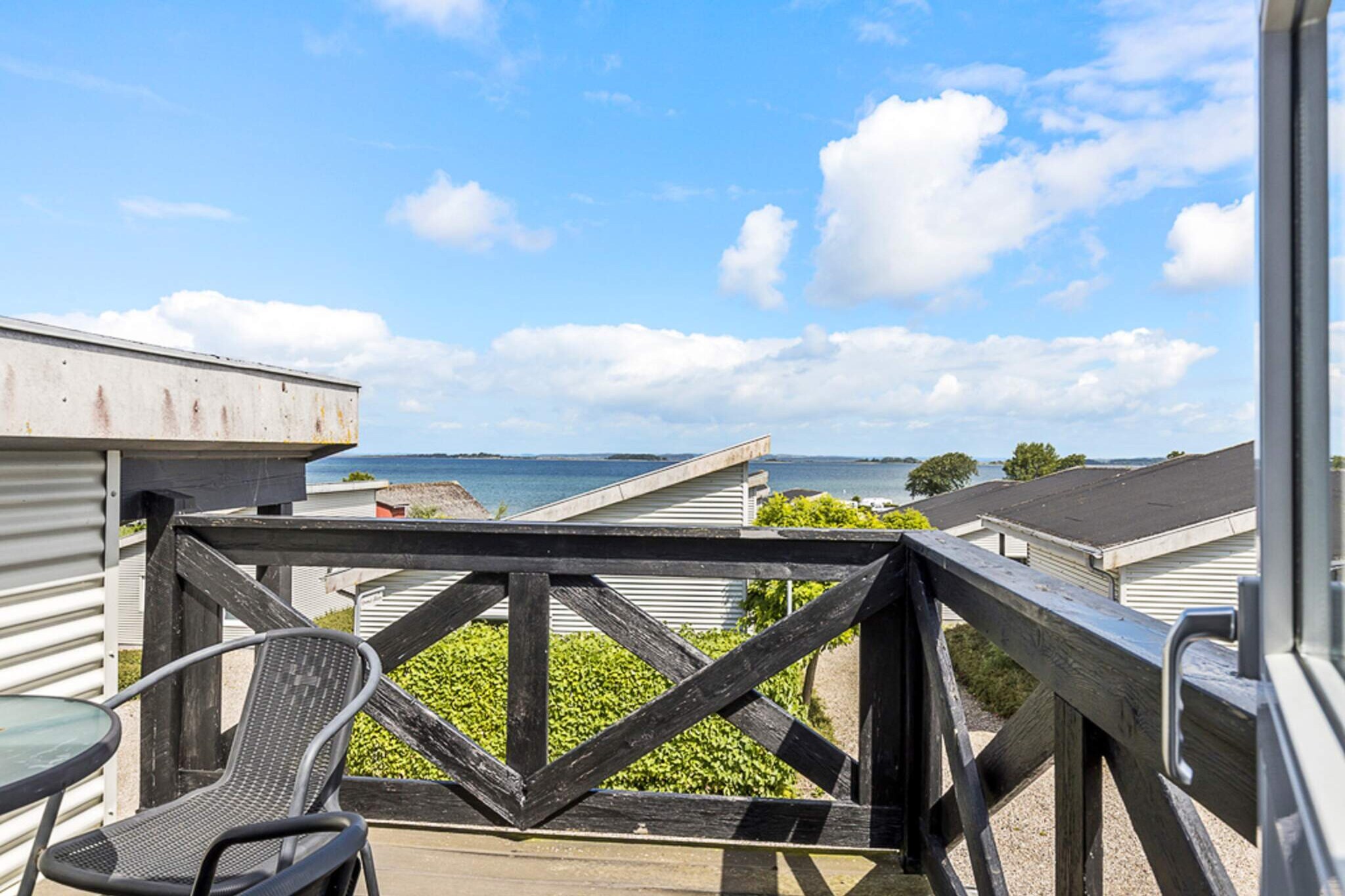 Welcome to First Camp Bøjden Strand, where the sea is right next door, offering a perfect setting for your camping holiday. Nestled in the beautiful South Funen archipelago, our campsite is surrounded on three sides by stunning, child-friendly beaches and is just a stone's throw away from the peaceful waters of Helnæs Bay. Whether you're seeking a relaxing family getaway or an adventurous escape with water activities, we provide everything you need for a memorable stay. Let's explore our cozy cabins, amazing amenities, and fun-filled experiences awaiting you! Accommodation at First Camp Bøjden Strand:  Spectacular Location: Our campsite is bordered by a fantastic, child-friendly beach and provides breathtaking views of the South Funen archipelago. Variety of Cabins: We offer cabins in all price ranges, with fully equipped kitchens, comfortable living spaces, and cozy environments. Enjoy beautiful sunsets, nature, and easy access to Faaborg. Water Park & Play Areas: Enjoy our indoor and outdoor water parks or let the kids play in our educational Kompan playgrounds. Sailing & Water Sports: If you're a fan of sailing, First Camp Bøjden Strand offers excellent facilities for boats in the safe waters of Helnæs Bay.  Bistro & Dining:  After an exciting day filled with activities, head to our bistro where you can relax and enjoy a variety of delicious hot and cold food options. Grab a refreshing soda or a tasty appetizer and unwind after a day of fun at Bøjden Strand.  With all these fantastic features, First Camp Bøjden Strand is the perfect place for a family vacation full of adventure, relaxation, and scenic beauty!
