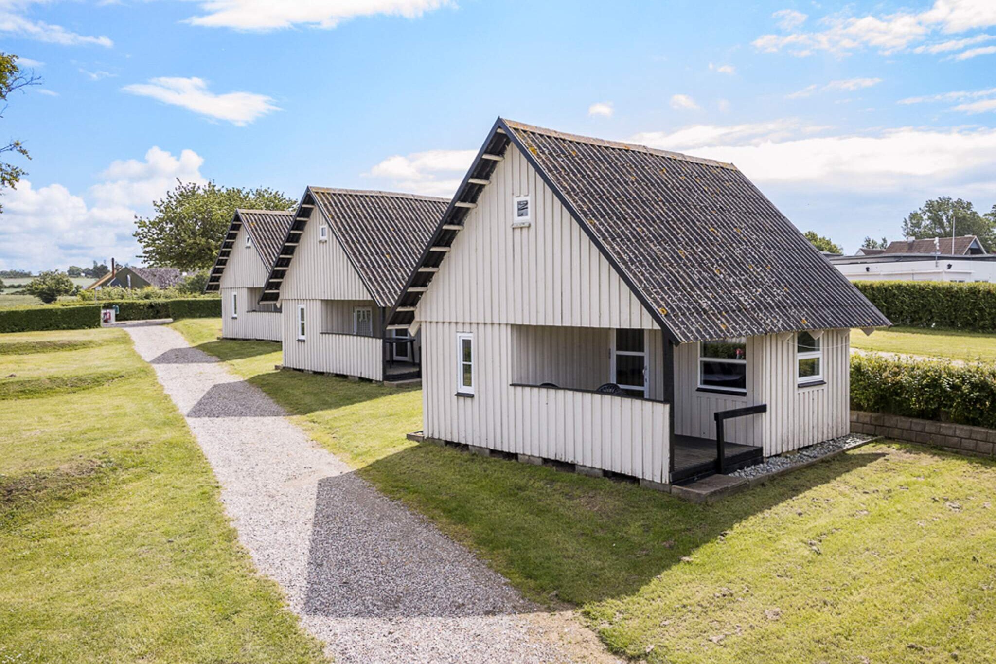 Kitchen(coffee machine, fridge(+ freezer)), Living/bed room(double folding bed, TV), bedroom(double bed), bedroom(2x single bed), bathroom(washbasin, shower, toilet), heating(central), terrace, garden furniture, BBQ, parking, swimming pool, play equipment, football goal