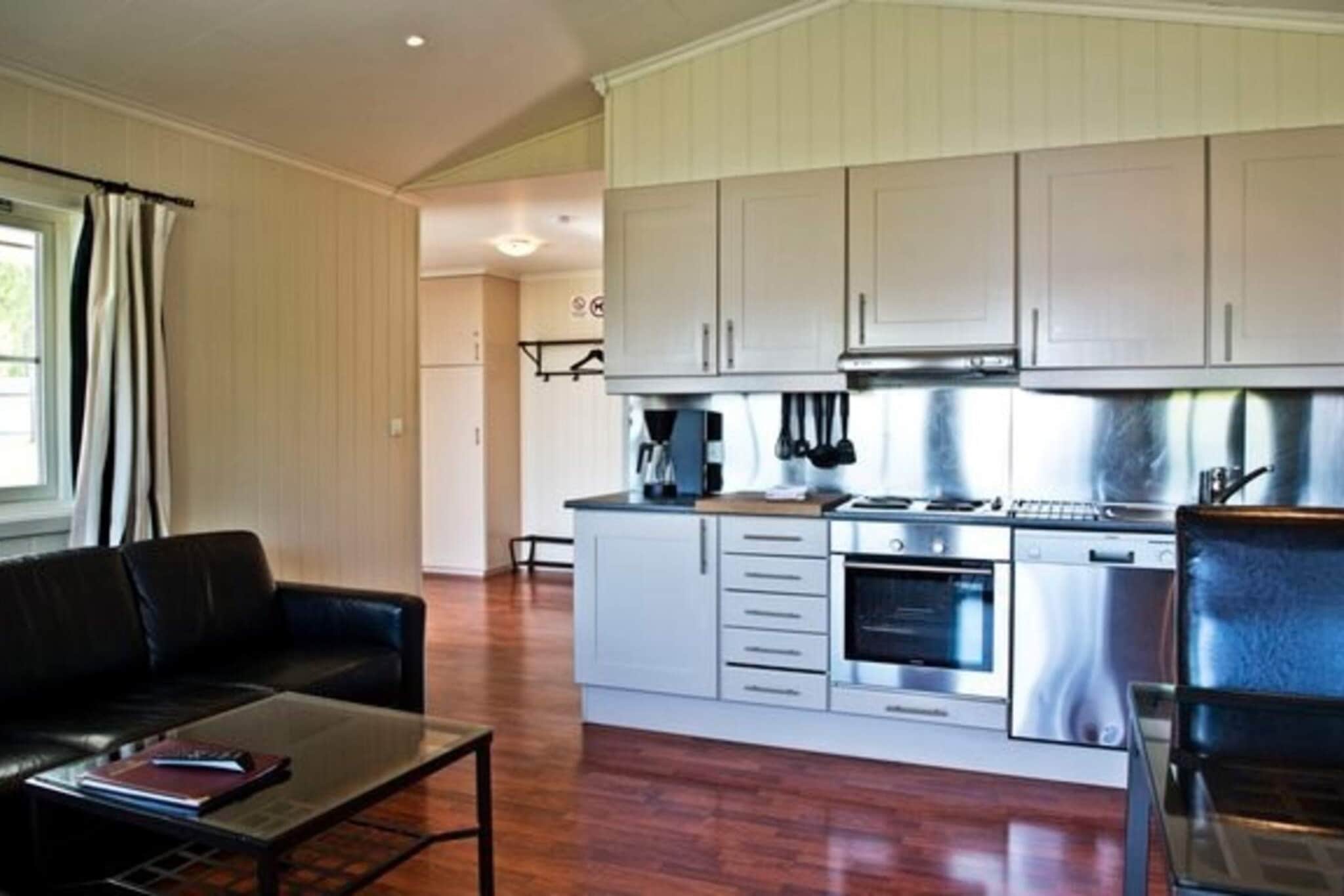 Kitchen(coffee machine, oven, microwave, dishwasher, fridge(+ freezer)), Living/bed room(TV), bedroom(double bed, bunk bed), bedroom(double bed, bunk bed), bathroom(washbasin, shower, toilet), heating(central), terrace, garden furniture, parking