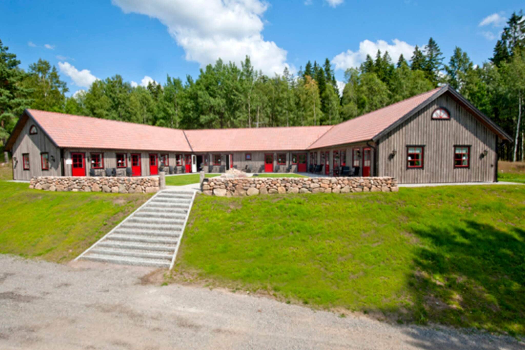 This charming little hotel offers beautiful rooms with stunning natural surroundings. All rooms have a private bathroom, TV, desk, and direct access to a patio overlooking the garden or lake.  The rooms have a small mini fridge, There are two room types and parking is available. The larger room has a comfortable sofa in the living room and all rooms have Wi-Fi. Guests can enjoy cycling, fishing, or hiking in the beautiful surroundings. A stay here is both relaxing and inviting, with nature encouraging activity. The hotel is ideally located in Håcksvik and is surrounded by natural beauty, including lakes and gardens, perfect for outdoor activities. A short distance away, you will find Gekås Ullared, a popular department store, just 42 km away. Local cafés and markets offer a taste of regional cuisine and are an excellent place to explore. The nearest travel stations include bus and train lines, making it easy to reach surrounding attractions and the nearest airports. Additional amenities include a private bathroom with a shower, and bedding and towels are provided. Guests can also enjoy a breakfast buffet at an additional cost, which is available upon advance booking. Please note that there is no kitchen available for use, and the nearest restaurant and shop are approximately 13 km away.