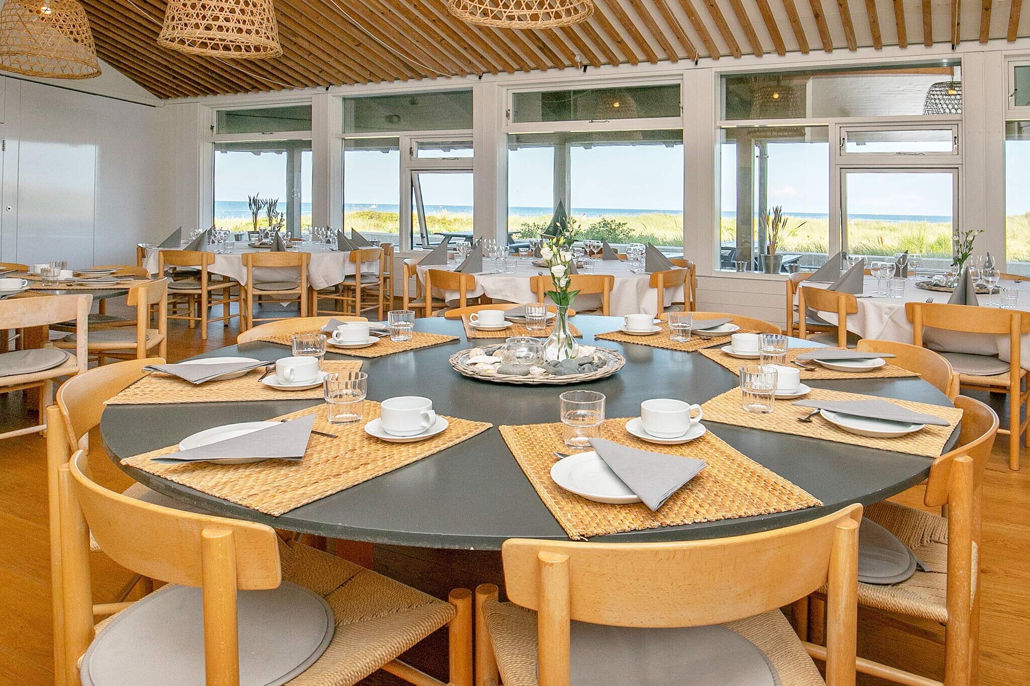 open kitchen(cooker(electric), hood, coffee machine, dishwasher, fridge-freezer), Living/bed room(TV(cable)), bedroom(2x single bed, 2x bunk bed), bedroom(double bed), bathroom(floor heating)(washbasin, shower, toilet), bathroom(floor heating)(washbasin, shower, toilet), washing machine(shared with other guests, paid), heating(electric), terrace, parking