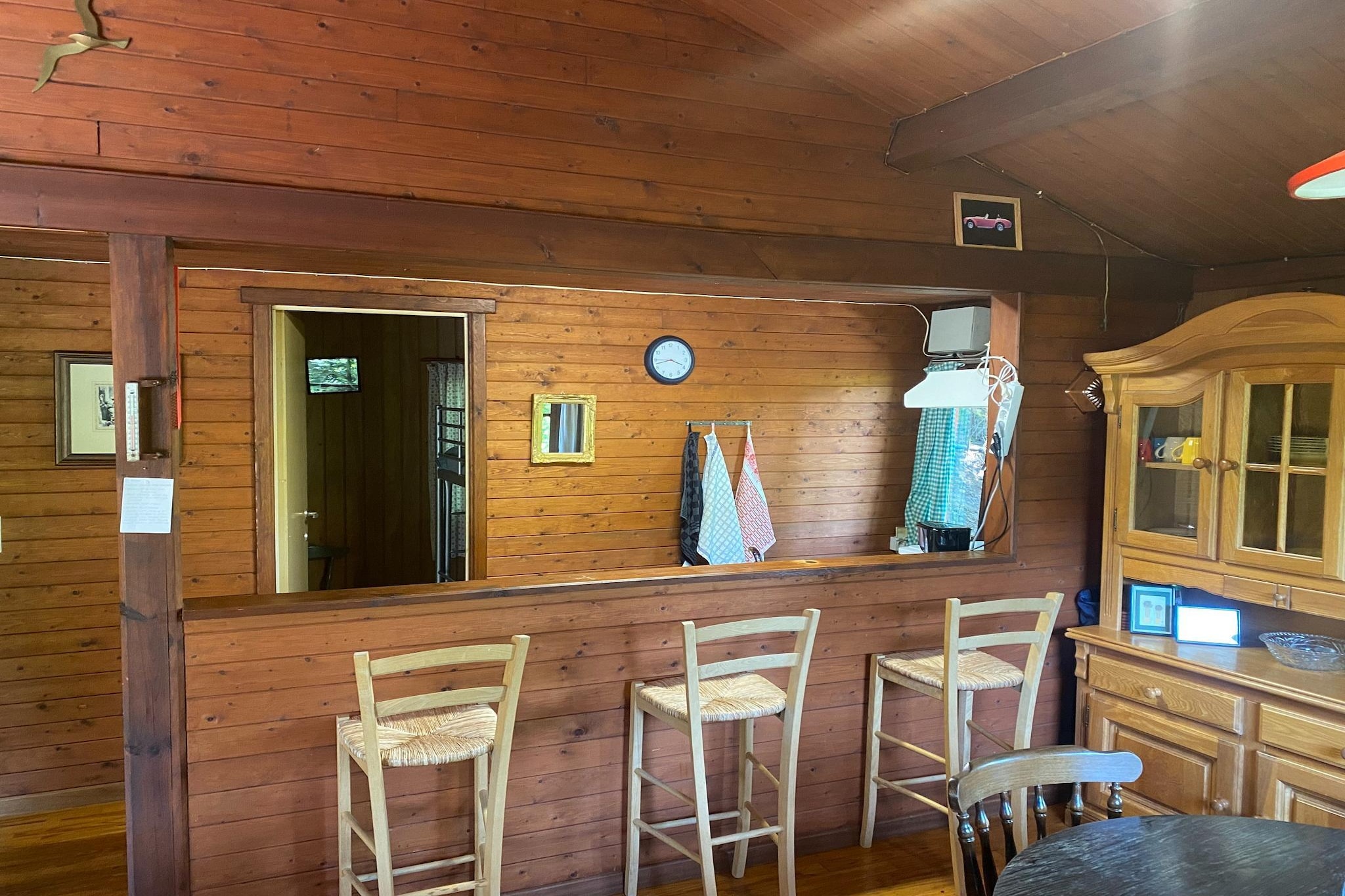 Ground floor: (Living room(fireplace, seating area), Kitchen(dining table, hob, hob, toaster, cooker(3 ring stoves, gas), cooker, coffee machine, oven, microwave, fridge, fridge), bedroom(double bed), bedroom(bunk bed), bathroom(shower, washbasin, toilet))\n\nterrace, garden, garden furniture, parking