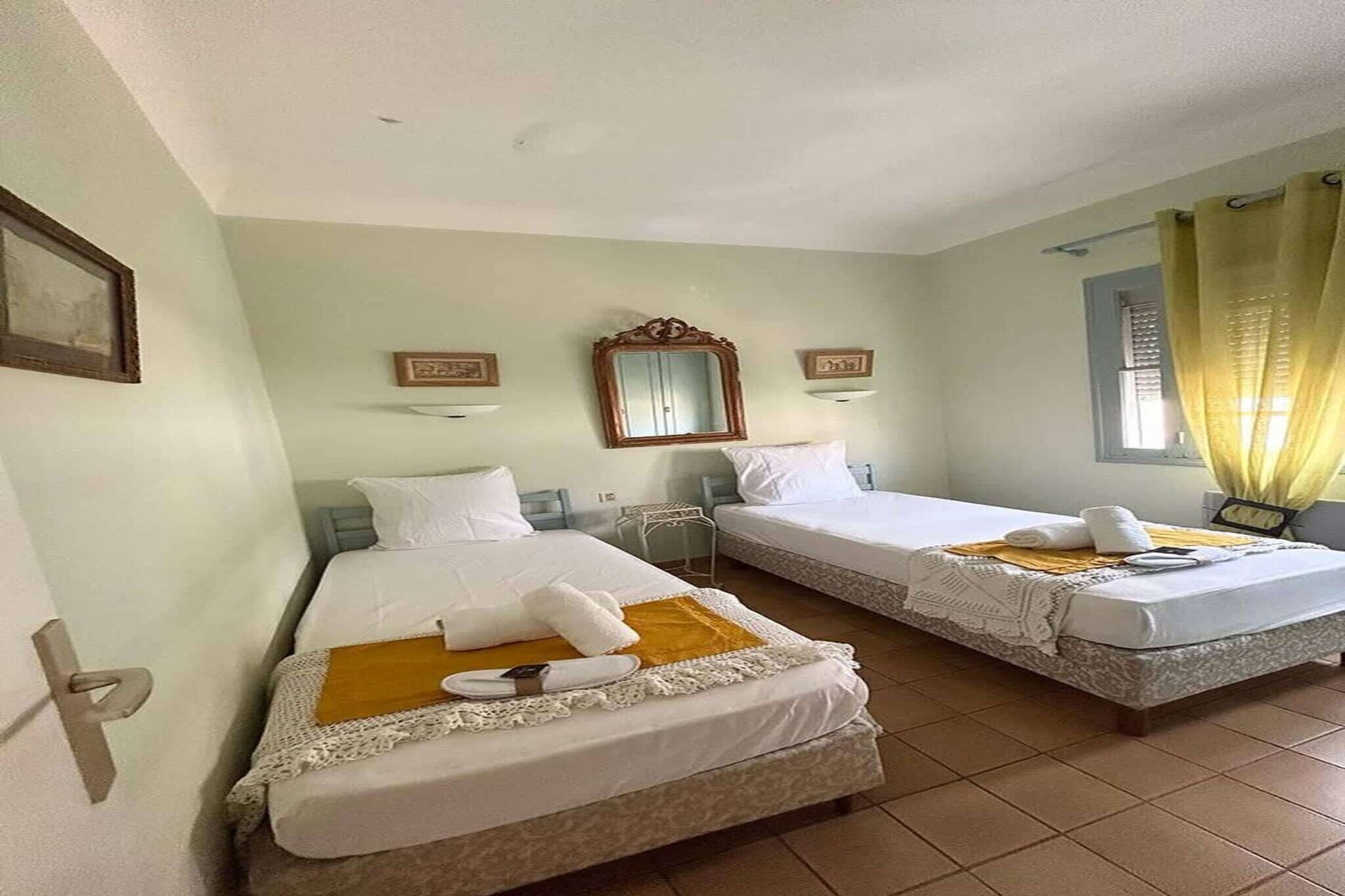 Discover the charm of Valras-Plage in this spacious and welcoming apartment just 50 meters from the beach. With three comfortable bedrooms and a fresh coastal dÃ©cor, this first-floor retreat is perfect for families or groups of friends seeking a relaxing seaside holiday. Located in a quiet cul-de-sac, the apartment offers peace and privacy while being just steps from shops, restaurants, and local attractions.

The apartment features a fully equipped independent kitchen with refrigerator, cooktop, microwave, coffee maker, and all necessary utensils. Guests enjoy a bright living space, Wi-Fi, flat-screen TV, and fans for comfort during warmer days. The bathroom includes a shower, with separate toilets for added convenience. Bed linens, towels, and heating are provided, ensuring a stress-free stay from arrival to departure.

Situated in a safe and family-friendly neighborhood, everything is within walking distanceâ€”from the beach and casino to markets and a Carrefour City. The ground floor remains unoccupied during summer, offering full privacy. With easy access to local activities, cultural spots, and practical amenities, this apartment is an ideal base for enjoying the best of Valras-Plage.