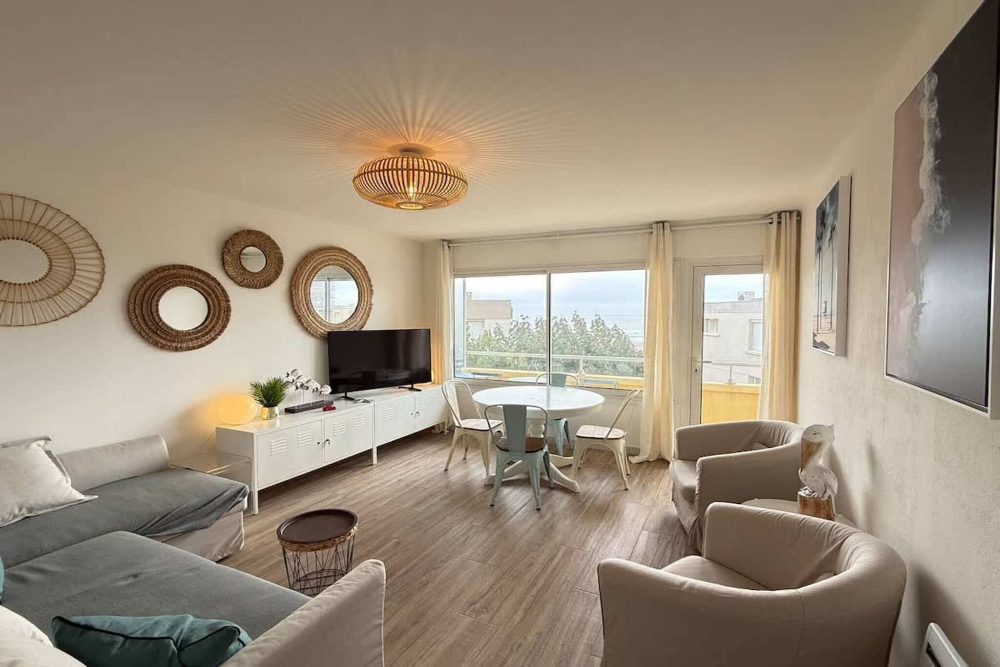 82 Vue Mer et Plage - Woonkamer