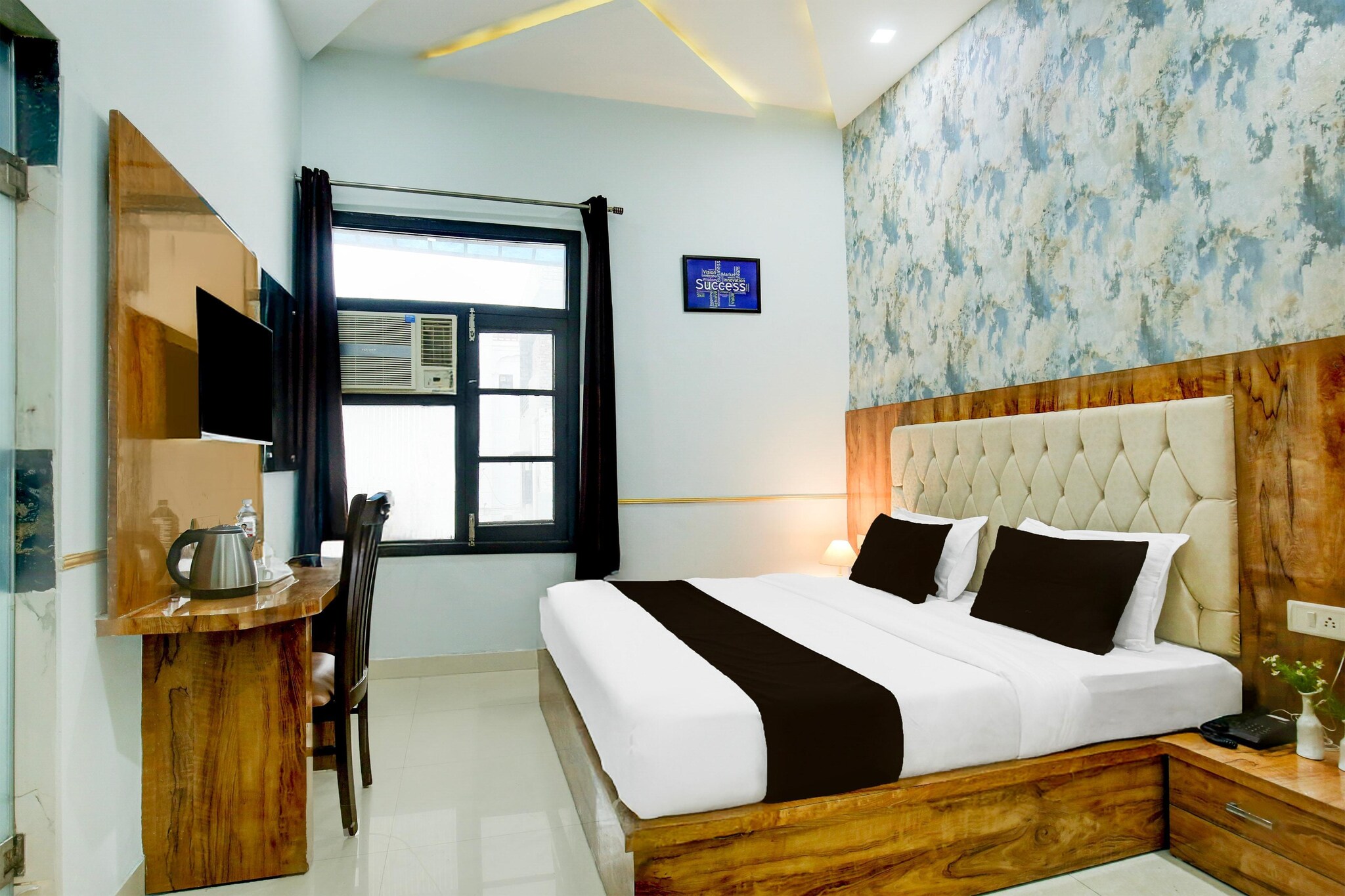 Comfortable Accommodations: Super Collection O Ishwar Nagar Near Golden Temple Formerly Chahal Residency in Amritsar offers family rooms with air-conditioning, private bathrooms, work desks, and free WiFi. Each room includes a TV, wardrobe, and tiled floors.

Convenient Facilities: Guests enjoy a lounge, lift, 24-hour front desk, shared kitchen, housekeeping service, room service, and luggage storage. Free on-site parking is available.

Dining Options: A continental breakfast is served daily.

Local Attractions: The Golden Temple is 3 km away, Jallianwala Bagh and Durgiana Temple are 3 km, and Wagah Border is 32 km from the hotel. Sri Guru Ram Dass Jee International Airport is 15 km distant.

Early Check-In Policy: A full dayâ€™s room rate will be charged for check-ins before 6:00 AM. Complimentary early check-in is available between 6:00 AM and 10:00 AM, subject to room availability.

Check-in is only available to guests aged 18 and above. Please provide a government-issued ID to confirmÂ yourÂ age.