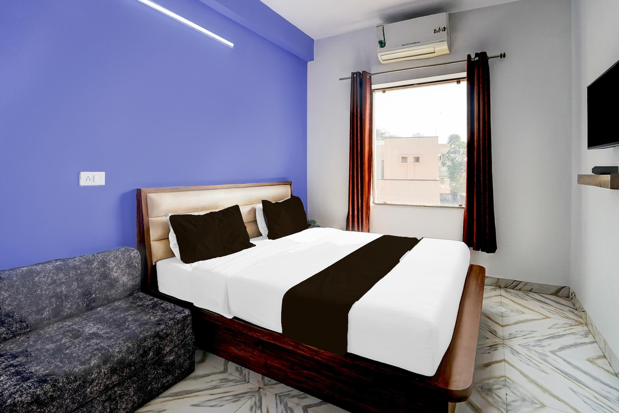 Comfortable Accommodations: Super Collection O Salasar Balaji Temple Formerly Keshav Mahal in Churu offers family rooms with air-conditioning, private bathrooms, and free WiFi. Each room includes a work desk, seating area, TV, and wardrobe.
Dining Experience: The hotel features a family-friendly restaurant serving Indian cuisine in a traditional, modern, and romantic ambience. Guests can enjoy lunch and dinner in a comfortable setting.
Convenient Facilities: The property provides a 24-hour front desk, housekeeping, laundry, room service, and luggage storage. Additional amenities include free toiletries, shower, dressing room, and tiled floors.
Location and Access: Located 158 km from Kishangarh Airport, the hotel offers easy access to local attractions.
Couples in particular like the location – they rated it 8.4 for a two-person trip.
Unmarried couples are warmly welcome at this property.
Guests with local ID proof are warmly welcome.
Early Check-In Policy: A full day’s room rate will be charged for check-ins before 6:00 AM. Complimentary early check-in is available between 6:00 AM and 10:00 AM, subject to room availability.
Check-in is only available to guests aged 18 and above. Please provide a government-issued ID to confirm your age.