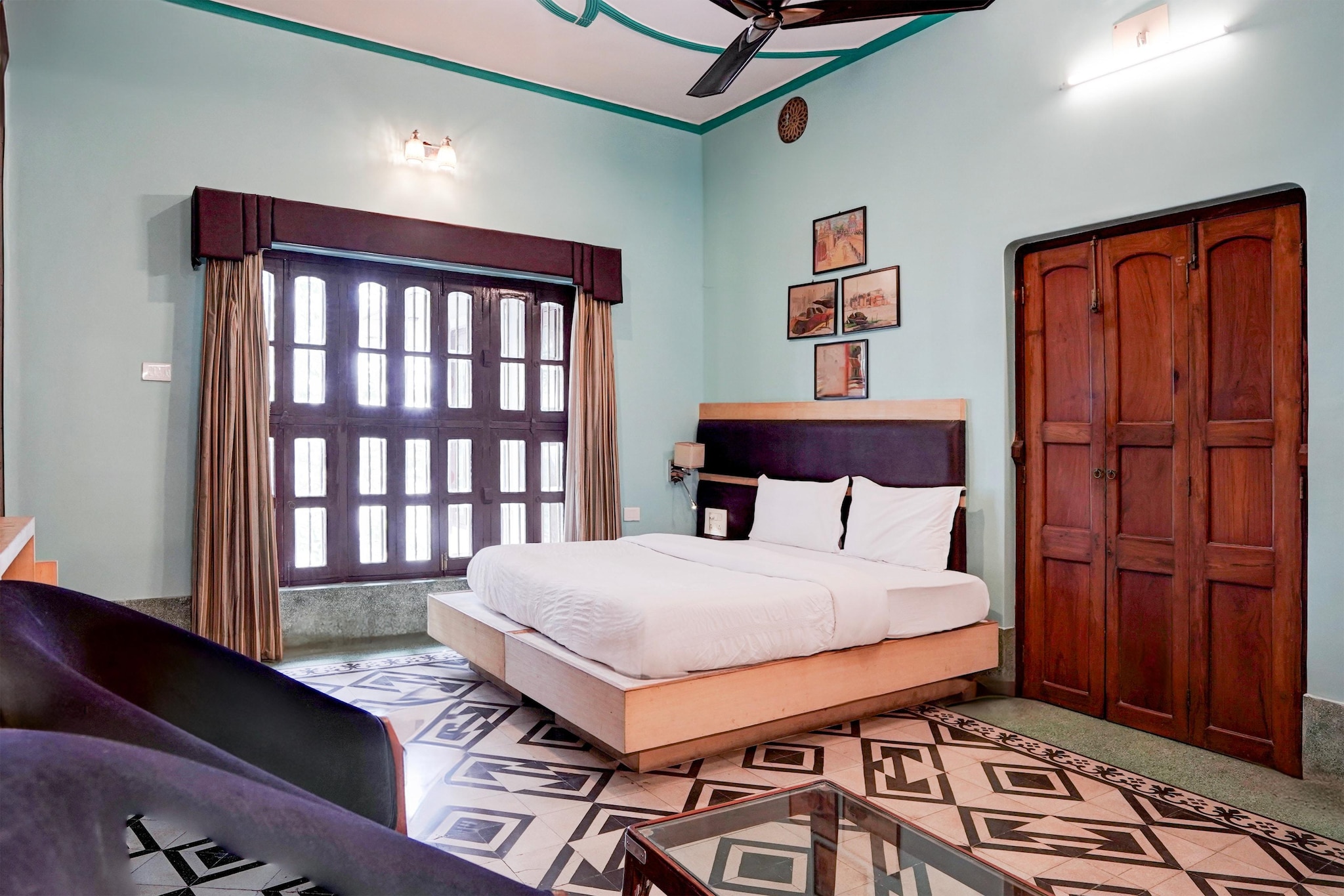 Comfortable Accommodations: Palette Heritage Scindia Ghat in Varanasi offers family rooms with air-conditioning, private bathrooms, and free WiFi. Each room includes a work desk, seating area, TV, and wardrobe.

Dining Experience: The family-friendly restaurant serves Indian cuisine in a welcoming ambience. Guests can enjoy meals in the on-site restaurant or relax in the lounge.

Convenient Facilities: The hotel features a 24-hour front desk, lift, shared kitchen, housekeeping service, room service, and luggage storage. Pets are welcome.

Prime Location: Located 27 km from Lal Bahadur Shastri International Airport, the hotel is near attractions such as Manikarnika Ghat (8-minute walk), Dasaswamedh Ghat (1.3 km), and Kashi Vishwanath Temple (15-minute walk). Guests appreciate the convenient location and scenic views.

Unmarried couples are warmly welcome at this property.
Guests with local ID proof are warmly welcome.
Early Check-In Policy: A full dayâ€™s room rate will be charged for check-ins before 6:00 AM. Complimentary early check-in is available between 6:00 AM and 10:00 AM, subject to room availability.
Check-in is only available to guests aged 18 and above. Please provide a government-issued ID to confirmÂ yourÂ age.
