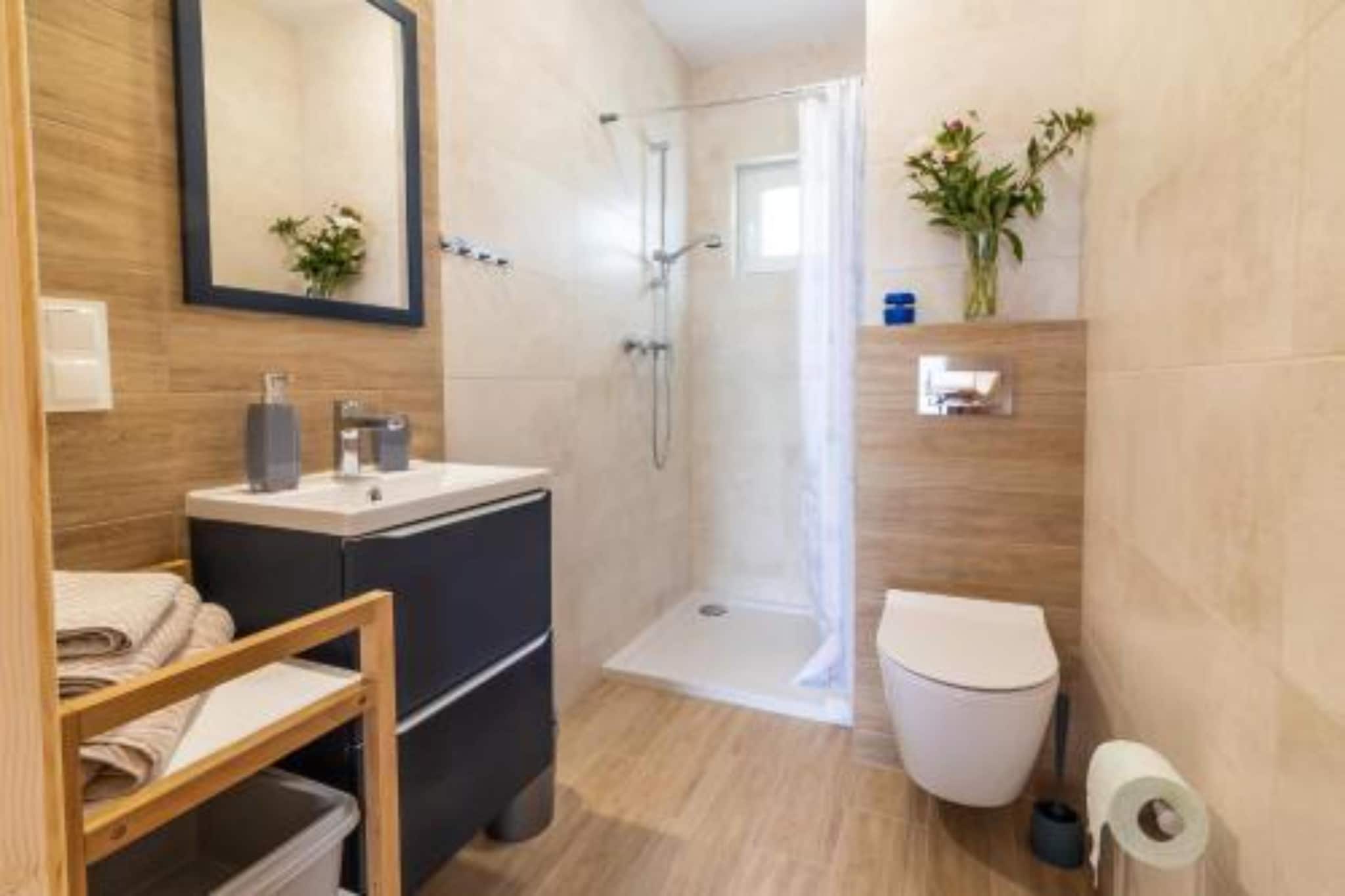Apartamenty parterowe dla 4 osób w Mielnie - Badkamer