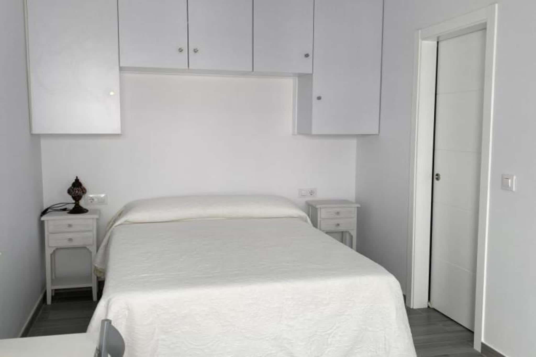 Nestled in the lively heart of Conil de la Frontera and just a short stroll from the golden sands, this charming retreat is designed for travelers who value both comfort and location. Bright and thoughtfully arranged, it offers a cozy living space with a well-equipped kitchen corner, a comfortable sleeping area, and a modern bathroom with shower. Air conditioning, a flat-screen TV, washing machine, and essential amenities ensure a stress-free stay.

What makes this getaway truly special is its unbeatable setting—steps from the beach and surrounded by Conil’s authentic tapas bars, local shops, and vibrant streets. Guests can easily move between relaxed seaside walks and lively evenings in town, making it the perfect balance of relaxation and exploration.

This accommodation particularly appeals to couples and solo travelers looking for convenience and charm in equal measure. Families with young children may also find it practical thanks to its central location and easy beach access. Whether you dream of lazy mornings by the sea, cultural wanderings through Andalusian streets, or evenings enjoying local flavors, this retreat is a welcoming base for memorable days in Conil.