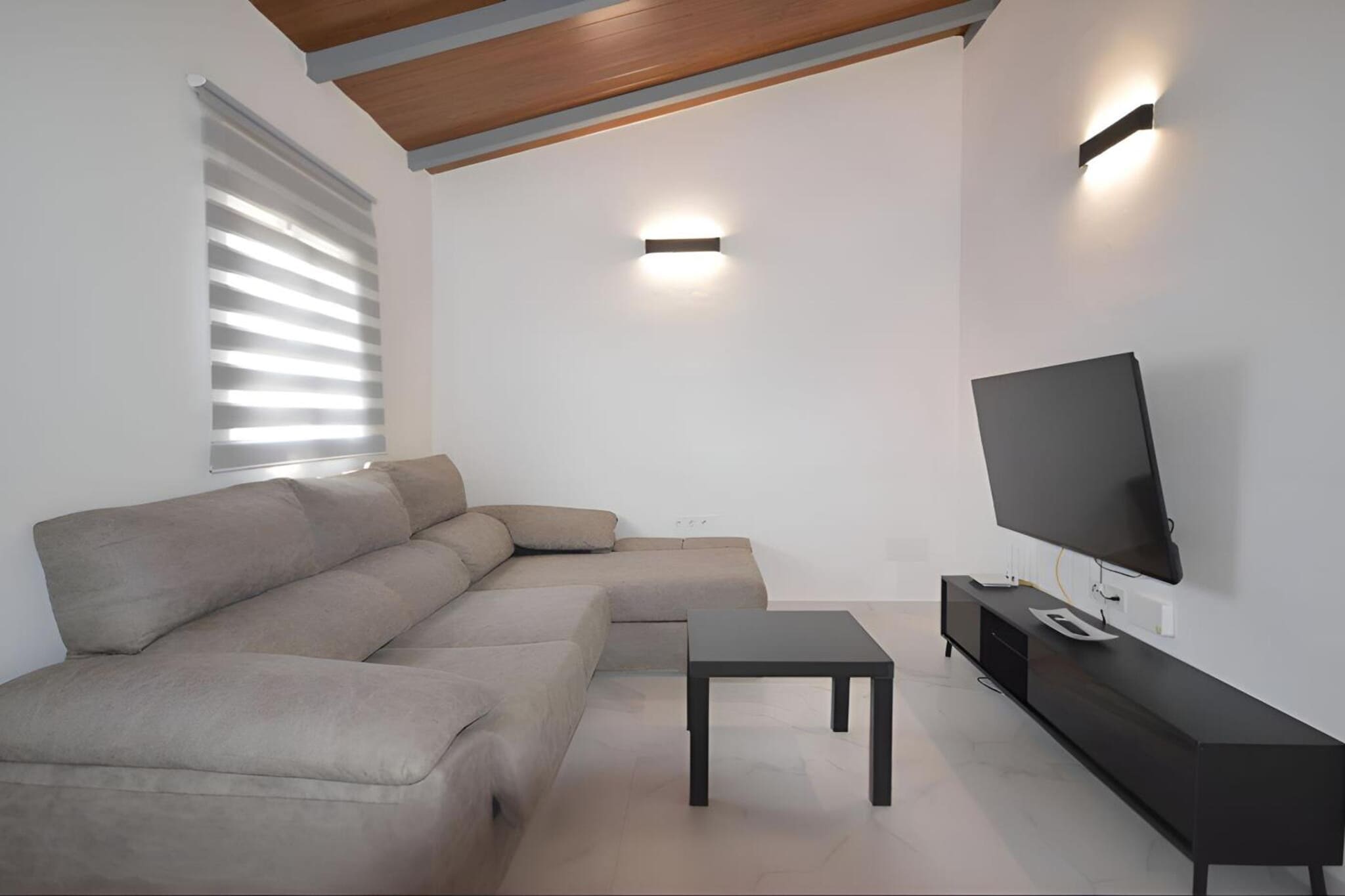 Escape to this charming chalet in Conil de la Frontera, where comfort meets tranquility. Perfectly suited for up to 4 guests, this 48 m² retreat features two cozy bedrooms—a double and two single beds—offering restful nights after days of sun-soaked adventures.

Step inside to find a fully equipped kitchen with a refrigerator, microwave, coffee maker, and all the essentials needed to prepare home-cooked meals. The private bathroom comes with a refreshing shower, while the living area provides a flat-screen TV and free Wi-Fi for entertainment and connectivity.

Outside, a private swimming pool awaits, offering panoramic views and a perfect spot to unwind under the Andalusian sun. Enjoy al fresco dining with the barbecue and furnished terrace, or simply relax in the landscaped garden. Additional conveniences include a private garage, free parking, outdoor furniture, and household essentials such as an iron and bed linen.

Located just a short drive from Real Novo Sancti Petri Golf Club and Parque Genovés, this chalet combines the serenity of a private getaway with easy access to Conil’s beautiful coast and local attractions. Whether you’re seeking a relaxing retreat or an active holiday, this property provides the perfect base to experience the charm of Andalusia.