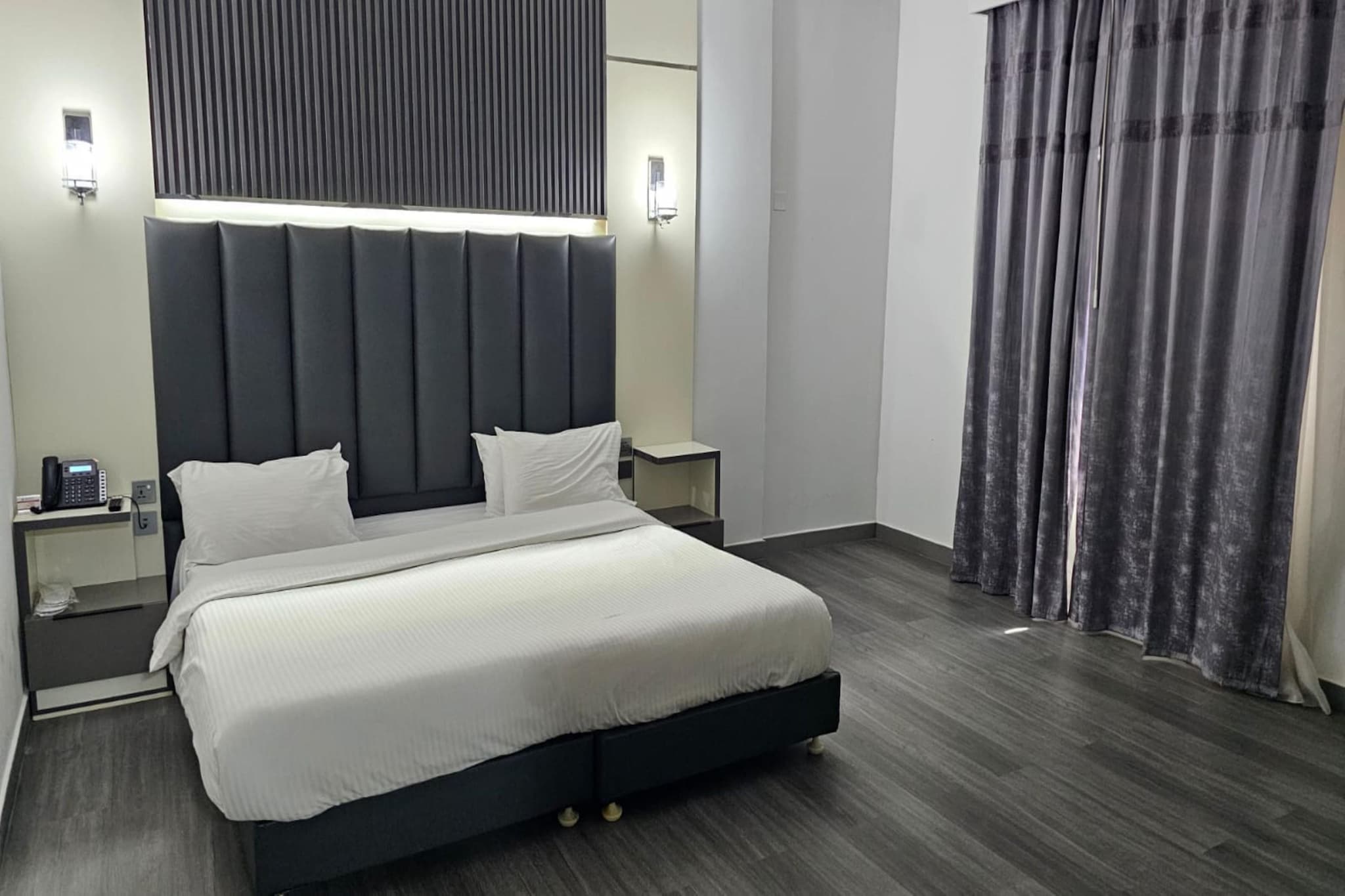 Ground floor: (bedroom(Internet access, double king size bed, TV, seating area, air conditioning, telephone), bathroom(shower, washbasin, toilet, bidet, Essentials))