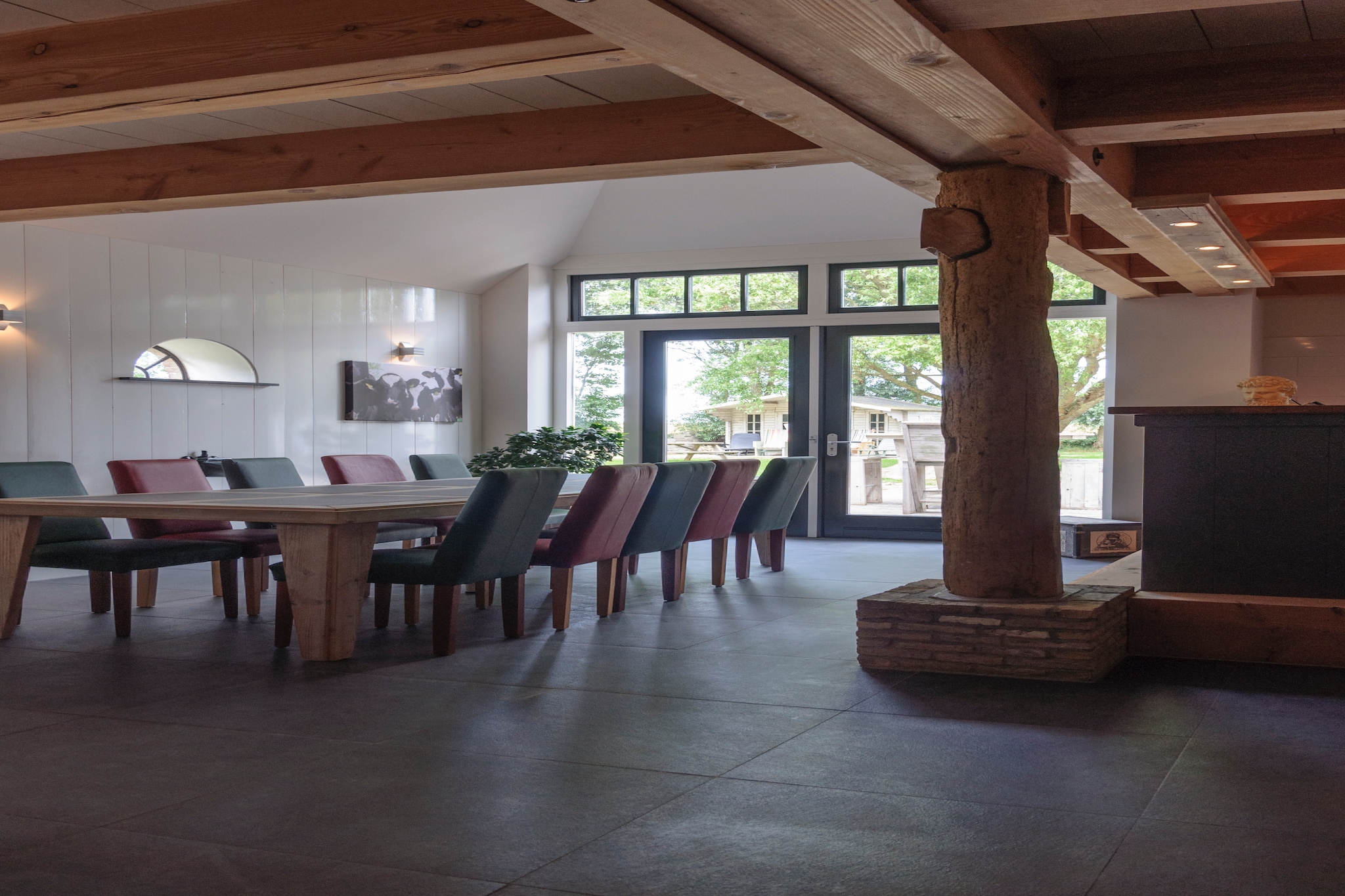 Ground floor: (open kitchen(electric kettle, coffee machine, combination microwave, microwave, dishwasher, dishes and cutlery, Cooking basics), Living/diningroom(TV(flatscreen), dining table, seating area), bedroom(single bed, single bed), bedroom(single bed, single bed), bedroom(double bed or 2 single beds), bedroom(double bed or 2 single beds), bedroom(double bed or 2 single beds), bathroom(shower, washbasin, toilet), bathroom(shower, washbasin, toilet))\n\nOn the 1st floor: (bedroom(double bed or 2 single beds), bedroom(double bed or 2 single beds), bedroom(double bed or 2 single beds), bedroom(double bed or 2 single beds), bedroom(double fold-away bed, double bed or 2 single beds), bathroom(shower, washbasin, toilet), bathroom(shower, washbasin, toilet))\n\nInternet access, terrace, garden, garden furniture, parking