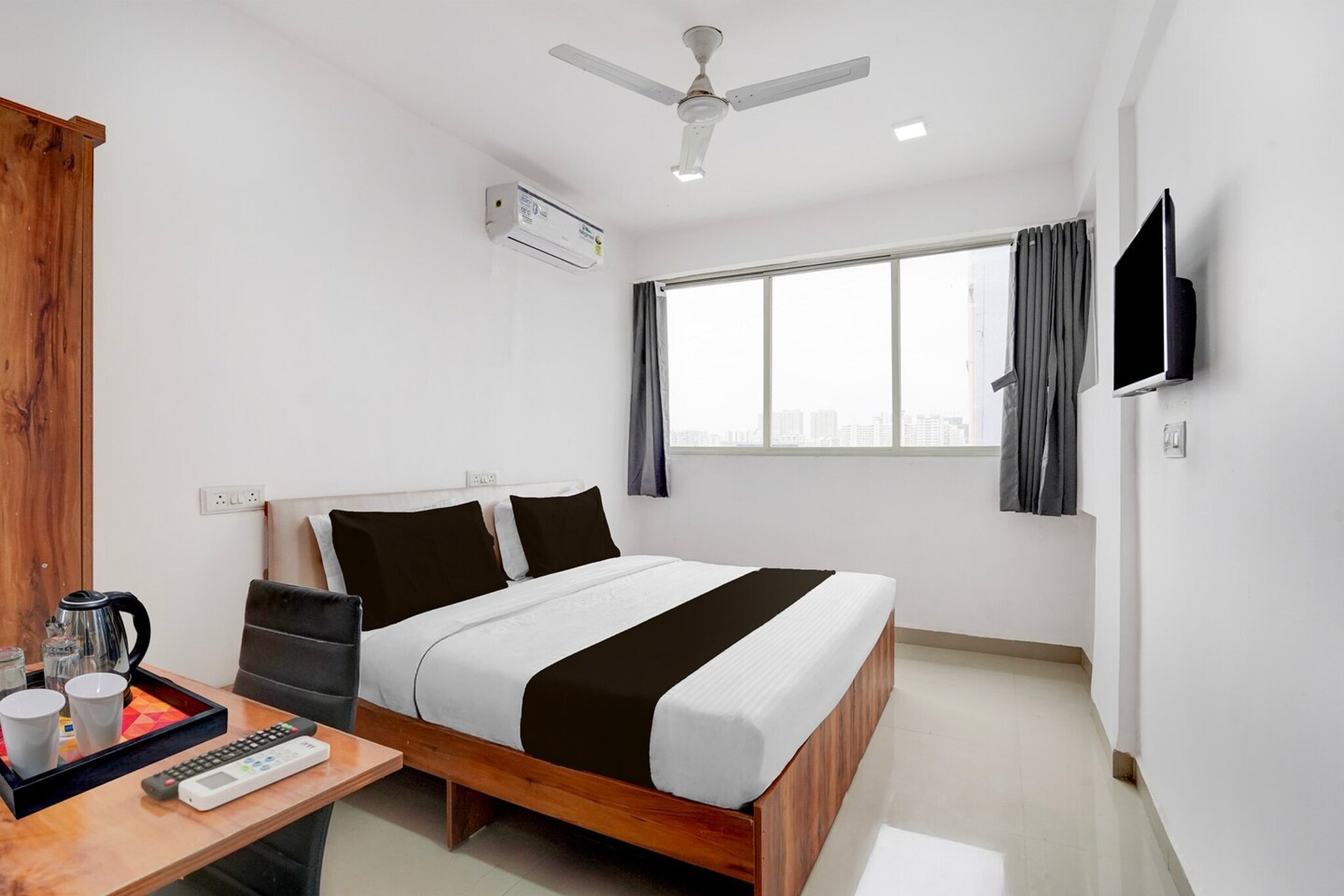 Located within 15 km of University of Pune and 17 km of Pataleshwar Cave Temple, Townhouse Hinjawadi Pune provides rooms with air conditioning and a private bathroom in Pune. With free WiFi, this 2-star hotel offers room service and a 24-hour front desk. The hotel features family rooms.
Guest rooms at the hotel are equipped with a seating area, a flat-screen TV with satellite channels and a private bathroom with free toiletries and a bath or shower. The rooms include a desk.
Fergusson College is 17 km from Townhouse Hinjawadi Pune, while Srimant Dagadusheth Halwai Ganapati Temple is 18 km away. Pune International Airport is 25 km from the property.
1. Unmarried couples are warmly welcome at this property.
2. Guests with local ID proof are warmly welcome.
Early Check-In Policy: A full day’s room rate will be charged for check-ins before 6:00 AM. Complimentary early check-in is available between 6:00 AM and 10:00 AM, subject to room availability.
Check-in is only available to guests aged 18 and above. Please provide a government-issued ID to confirm your age.