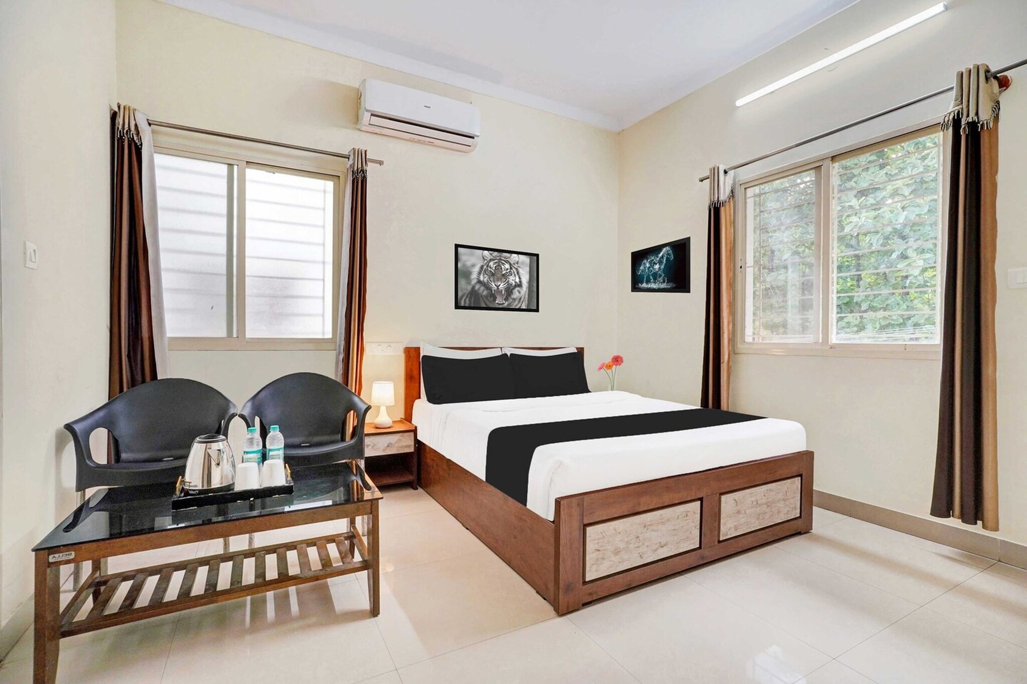Comfortable Accommodations: Collection O Hebbal Mysore in Mysore offers family rooms with air-conditioning, private bathrooms, work desks, and seating areas. Each room includes free toiletries, a bath or shower, TV, tiled floors, and a wardrobe.
Essential Facilities: Guests enjoy free WiFi, a 24-hour front desk, housekeeping service, room service, and luggage storage. The hotel provides a welcoming environment with English and Hindi spoken at reception.
Local Attractions: Located 22 km from Mysore Airport, the hotel is near Brindavan Garden (10 km), Mysore Palace (12 km), GRS Fantasy Park (6 km), and other points of interest.
Early Check-In Policy: A full day’s room rate will be charged for check-ins before 6:00 AM. Complimentary early check-in is available between 6:00 AM and 10:00 AM, subject to room availability.
Check-in is only available to guests aged 18 and above. Please provide a government-issued ID to confirm your age.