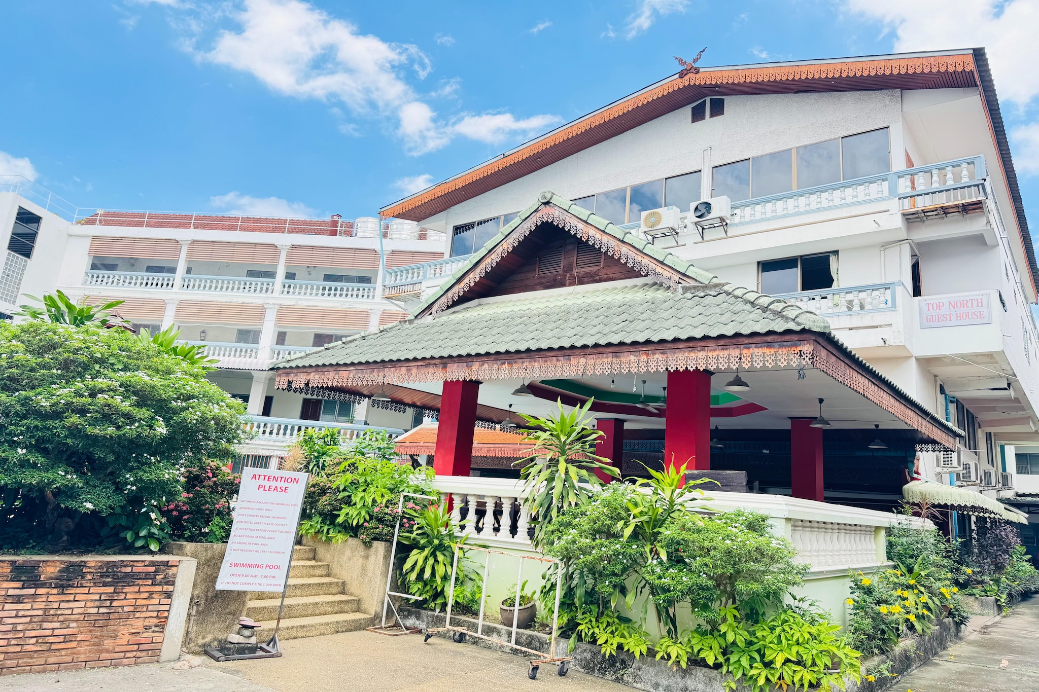 Tucked away in the heart of Chiang Mai, Collection O Top North Guesthouse offers the perfect mix of comfort, convenience, and authentic Thai hospitality. Whether you’re here to explore ancient temples, indulge in local cuisine, or simply unwind, this guesthouse provides a welcoming retreat for all kinds of travelers.
Relax by the outdoor swimming pool, soak in the peaceful garden views, or kick back in the cozy shared lounge. With spacious rooms, on-site dining, and thoughtful services like airport shuttle, tour assistance, and laundry, your stay is made easy from check-in to check-out.
🌟 Property Highlights:
🏊♂️ Outdoor Swimming Pool with sun loungers
🌐 Free Wi-Fi in public areas
🍽️ 2 On-Site Restaurants + Special diet menus on request
🚗 Free Private Parking (No reservation needed)
🛏️ Comfortable, Air-conditioned Rooms with private bathrooms
🚕 Airport Shuttle Service (additional charge)
🌺 Beautiful Garden & Sun Terrace
💼 Tour Desk, Luggage Storage, 24-Hour Front Desk
🛌 In-Room Amenities:
Fresh towels and linens
Private bathroom with shower & free toiletries
Wardrobe, clothes rack, cable TV
🧳 Ideal For:
Budget-conscious solo travelers
Couples seeking a peaceful stay
Families looking for comfort & convenience
Explorers ready to discover Chiang Mai’s old-world beauty
✅ Extras:
Daily housekeeping
On-site ATM
Car & bicycle rental options
English and Thai-speaking staff