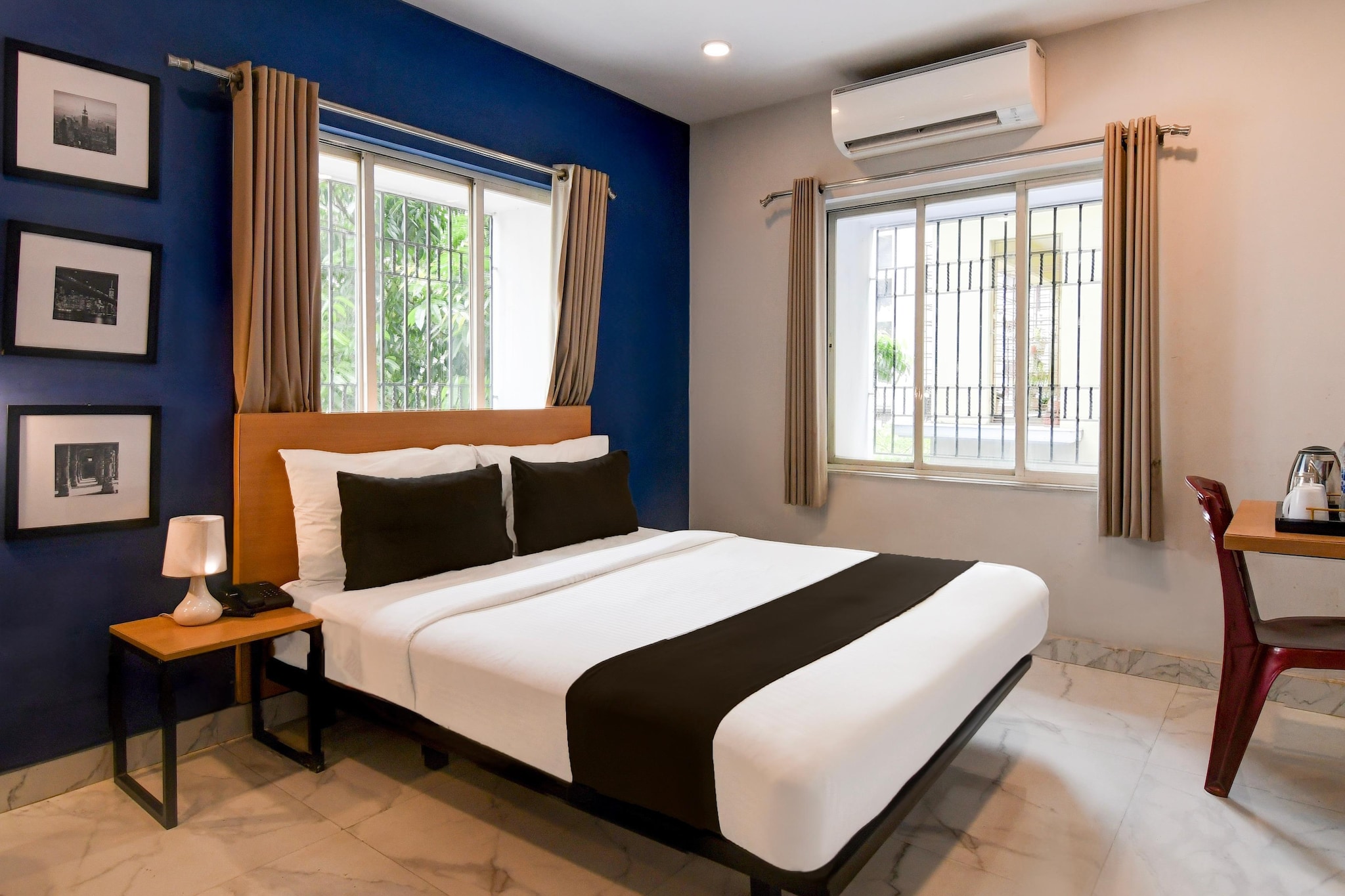Comfortable Accommodations: Super Collection O Bisarjan Ghat Formerly Eden Rocks in Kolkata offers family rooms with air-conditioning, private bathrooms, work desks, and free WiFi. Each room includes a TV, wardrobe, and tiled floors.

Dining Experience: The family-friendly restaurant serves Indian cuisine in a welcoming ambience. Guests can enjoy meals in the on-site restaurant or order room service.

Convenient Facilities: The hotel features a lounge, lift, 24-hour front desk, shared kitchen, housekeeping service, full-day security, room service, and luggage storage. Free on-site parking is available.

Prime Location: Located 10 km from Netaji Subhash Chandra Bose International Airport, the hotel is near Dumdum Metro Station (14 km), Sealdah Railway Station (14 km), and Eden Gardens (18 km).

Unmarried couples are warmly welcome at this property.
Guests with local ID proof are warmly welcome.
Apologies, but we are currently unable to host foreign nationals at this property.
Early Check-In Policy: A full dayâ€™s room rate will be charged for check-ins before 6:00 AM. Complimentary early check-in is available between 6:00 AM and 10:00 AM, subject to room availability.

Check-in is only available to guests aged 18 and above. Please provide a government-issued ID to confirmÂ yourÂ age.
