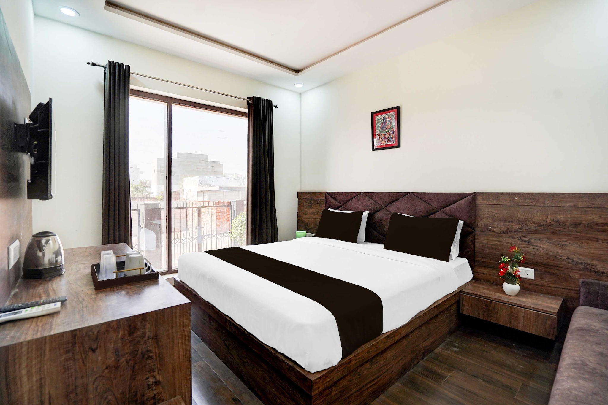 Comfortable Accommodations: Collection O Taj Nagri Basai in Agra offers family rooms with air-conditioning, private bathrooms, work desks, and seating areas. Each room includes free toiletries, a bath or shower, TV, tiled floors, and a wardrobe.
Essential Facilities: Guests enjoy free WiFi, a 24-hour front desk, housekeeping service, room service, and luggage storage. The hotel provides a welcoming environment with English and Hindi spoken at reception.
Prime Location: Located 17 km from Agra airport, the hotel is 12 km from the Taj Mahal, 13 km from Agra Fort and Jama Masjid, and 14 km from Mankameshwar Temple. Nearby attractions include TDI Mall and Jaypee Convention Centre.
Unmarried couples are warmly welcome at this property.
2. Guests with local ID proof are warmly welcome.
3.Early Check-In Policy: A full day’s room rate will be charged for check-ins before 6:00 AM. Complimentary early check-in is available between 6:00 AM and 10:00 AM, subject to room availability.
4.Foreign guests are welcome and allowed to stay at this property without any restrictions
Check-in is only available to guests aged 18 and above. Please provide a government-issued ID to confirm your age.