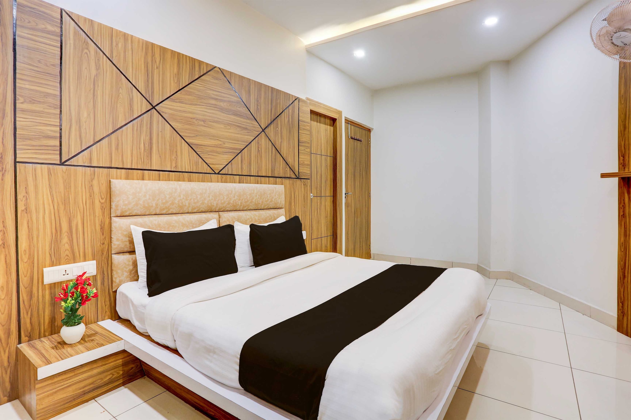 Comfortable Accommodations: Townhouse Oak Model Town Rohtak in Rohtak offers four-star comfort with free WiFi, air-conditioning, and private bathrooms. Each room includes a work desk, seating area, TV, and free toiletries.

Convenient Facilities: Guests benefit from a 24-hour front desk, housekeeping service, family rooms, room service, and luggage storage. Additional amenities include a work desk, seating area, TV, and tiled floors.

Prime Location: Located 66 km from Delhi International Airport, the hotel is 4.2 km from Rohtak Railway Station. Nearby attractions include the Rohtak Museum and the Rohtak Fort.

1. Unmarried couples are warmly welcome at this property.
2. Guests with local ID proof are warmly welcome.
3.Early Check-In Policy: A full dayâ€™s room rate will be charged for check-ins before 6:00 AM. Complimentary early check-in is available between 6:00 AM and 10:00 AM, subject to room availability.
4.Foreign guests are welcome and allowed to stay at this property without any restrictions
Check-in is only available to guests aged 18 and above. Please provide a government-issued ID to confirmÂ yourÂ age.