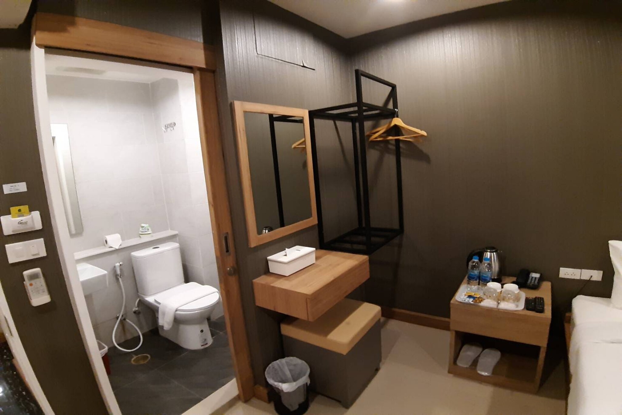 Comfortable Accommodations: Premium Double Retreat | Unwind in Style in Bangkok offers family rooms with private bathrooms, air-conditioning, and free WiFi. Each room includes a work desk, shower, wardrobe, and TV.
Essential Facilities: Guests can relax on the terrace or outdoor seating area. The hotel features a lounge, lift, housekeeping service, room service, and an outdoor seating area.
Convenient Location: Located 23 km from Don Mueang International Airport, the hotel is near Gaysorn Village Shopping Mall (16-minute walk), Central World (1.3 km), and SEA LIFE Bangkok Ocean World (1.7 km). Nearby attractions include Jim Thompson House (2 km) and Lumpini Park (4.1 km).
Guest Services: The hotel provides English and Thai-speaking reception staff, ensuring a comfortable stay.