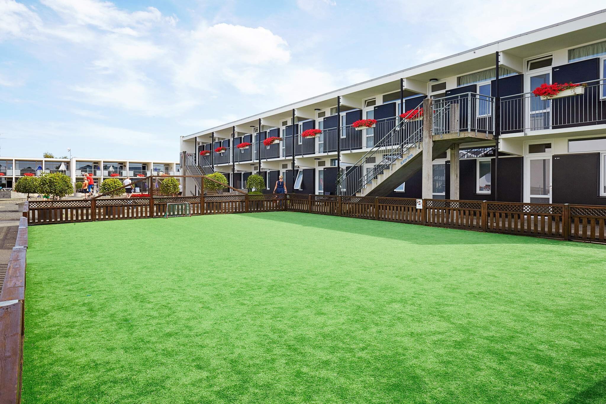 open kitchen(cooker(2 ring stoves), hood, coffee machine, oven(mini), dishwasher, fridge), Living/bed room(2x single folding bed), bedroom(2x single bed), bathroom(bathtub or shower, washbasin, hip bath, toilet), balcony or terrace, heating(central), parking