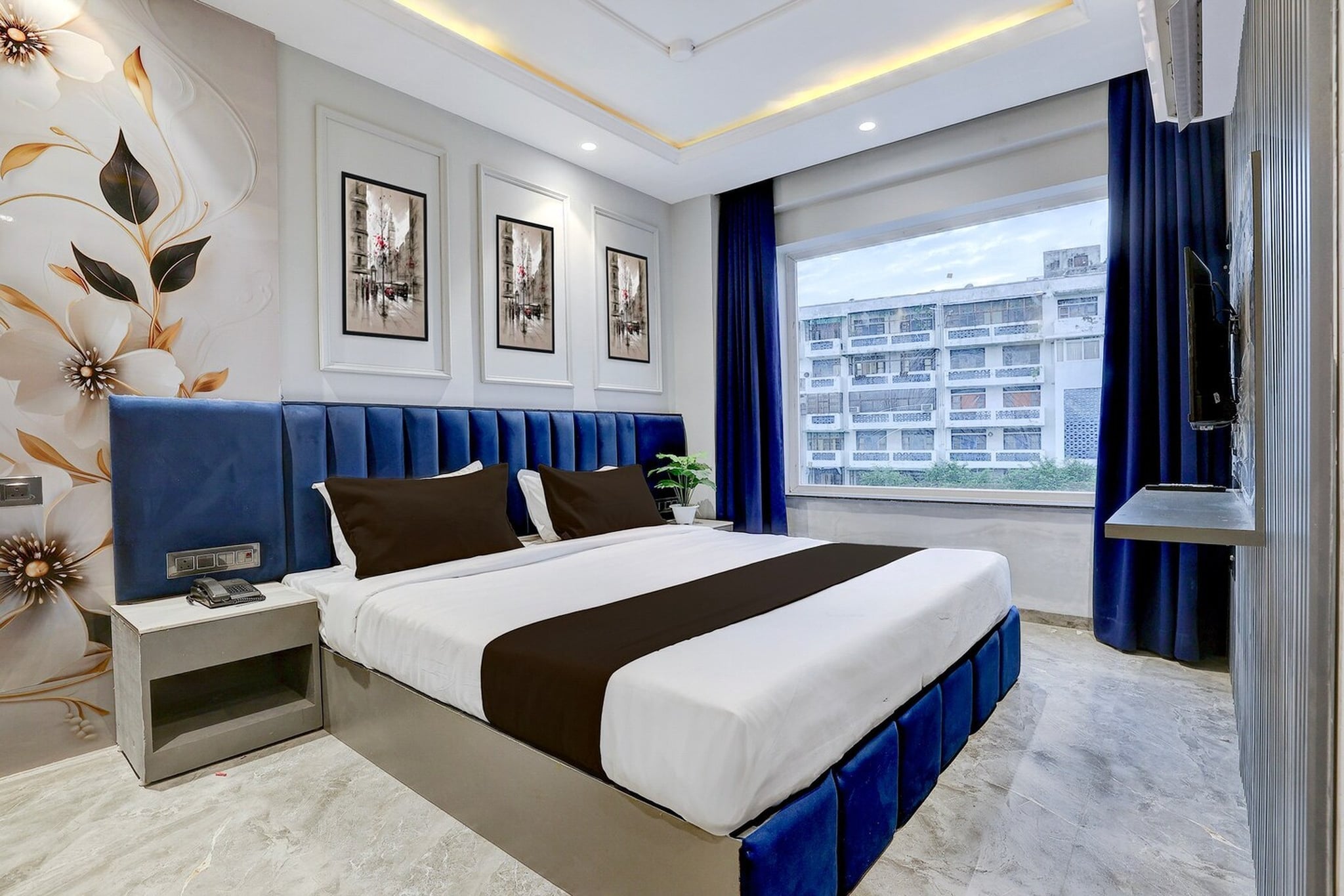 Set within 5 km of Mansa Devi Temple and 3.8 km of Har Ki Pauri, Townhouse Haridwar Vishwakarma Ghat Formerly Haridwar Aagman offers rooms with air conditioning and a private bathroom in HaridwÄr. This 3-star hotel offers room service, a 24-hour front desk and free WiFi. The property is non-smoking and is situated 4.2 km from Haridwar Railway Station.

The units at the hotel come with a seating area, a flat-screen TV with satellite channels and a private bathroom with free toiletries and a bath or shower. The rooms feature a desk.

Rishikesh Railway Station is 27 km from Townhouse Haridwar Vishwakarma Ghat Formerly Haridwar Aagman, while Triveni Ghat is 27 km away. Dehradun Airport is 36 km from the property.

Unmarried couples are warmly welcome at this property.
Guests with local ID proof are warmly welcome.
Early Check-In Policy: A full dayâ€™s room rate will be charged for check-ins before 6:00 AM. Complimentary early check-in is available between 6:00 AM and 10:00 AM, subject to room availability.
Check-in is only available to guests aged 18 and above. Please provide a government-issued ID to confirmÂ yourÂ age.
