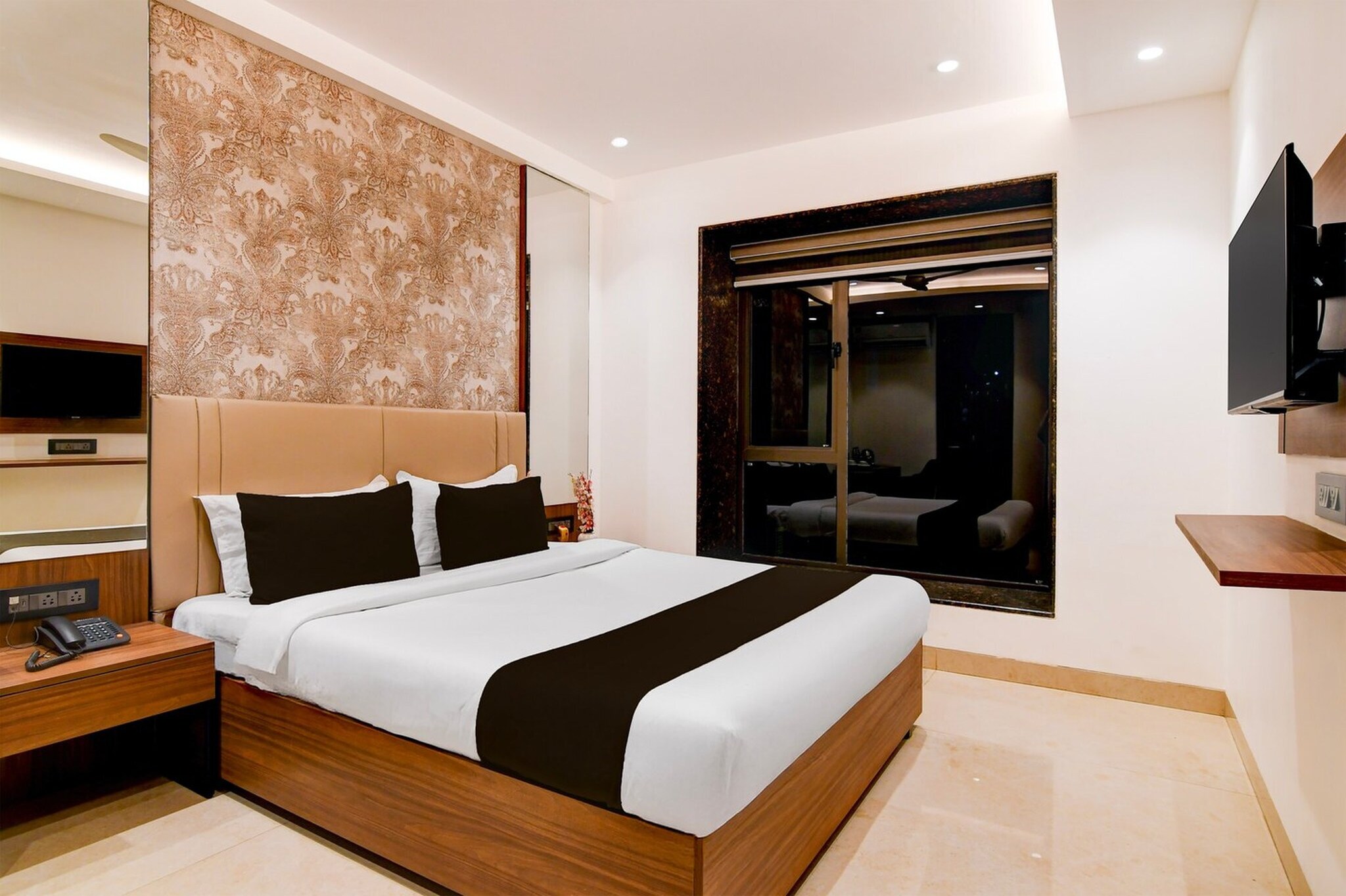 Enjoy a comfortable and hassle-free experience at our thoughtfully designed property. Each room is equipped with modern amenities, cozy bedding, and elegant decor to make you feel right at home. Located conveniently with easy access to public transport and major attractions, it's perfect for both business and leisure travelers. Cleanliness and guest comfort are our top priorities, and our team is available 24/7 to assist you throughout your stay.


1. Unmarried couples are warmly welcome at this property.
2. Guests with local ID proof are warmly welcome.
3.Early Check-In Policy: A full day’s room rate will be charged for check-ins before 6:00 AM. Complimentary early check-in is available between 6:00 AM and 10:00 AM, subject to room availability.
4.Foreign guests are welcome and allowed to stay at this property without any restrictions
Check-in is only available to guests aged 18 and above. Please provide a government-issued ID to confirm your age.