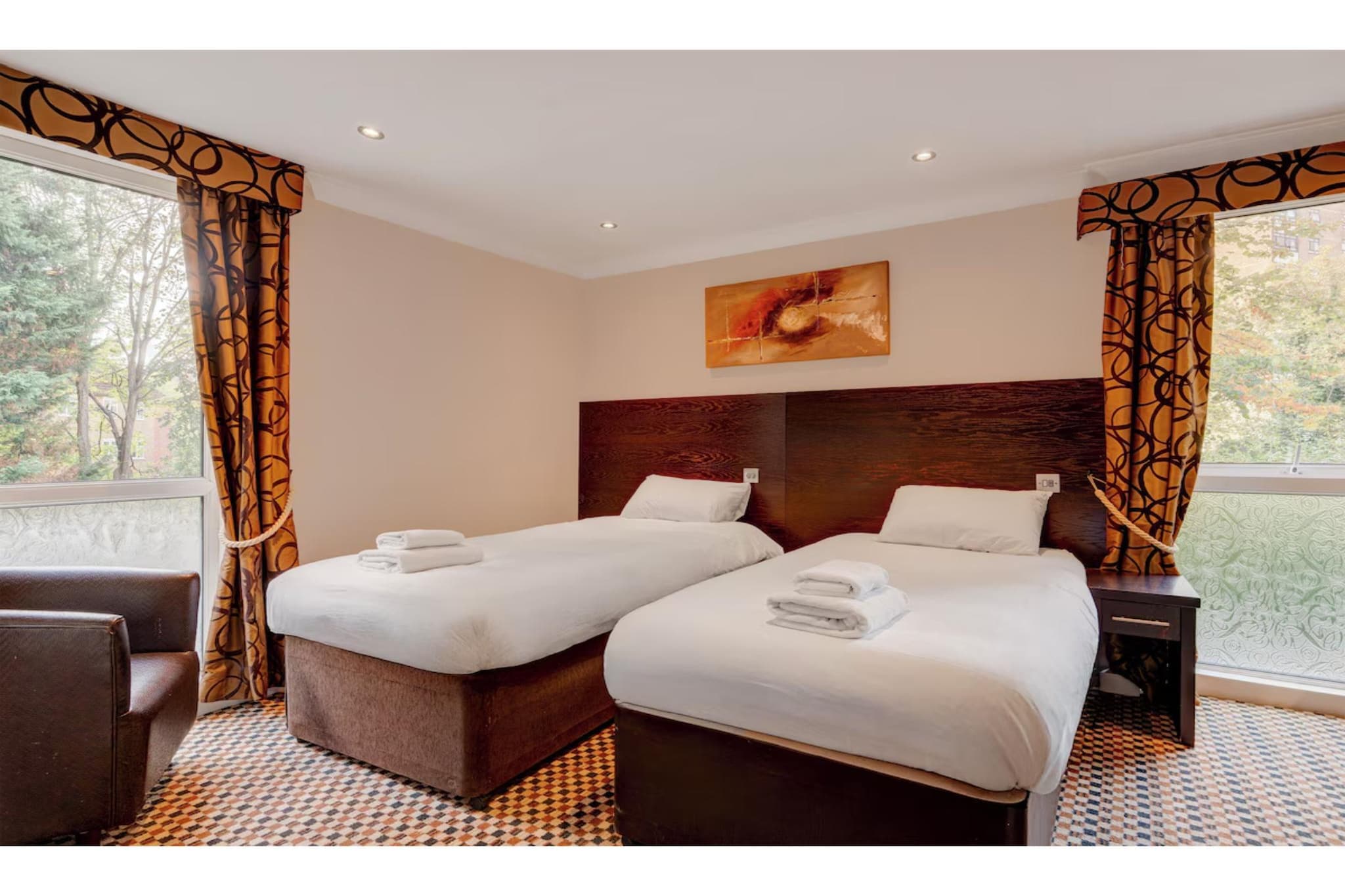 Standard Quad Room - Schlafzimmer