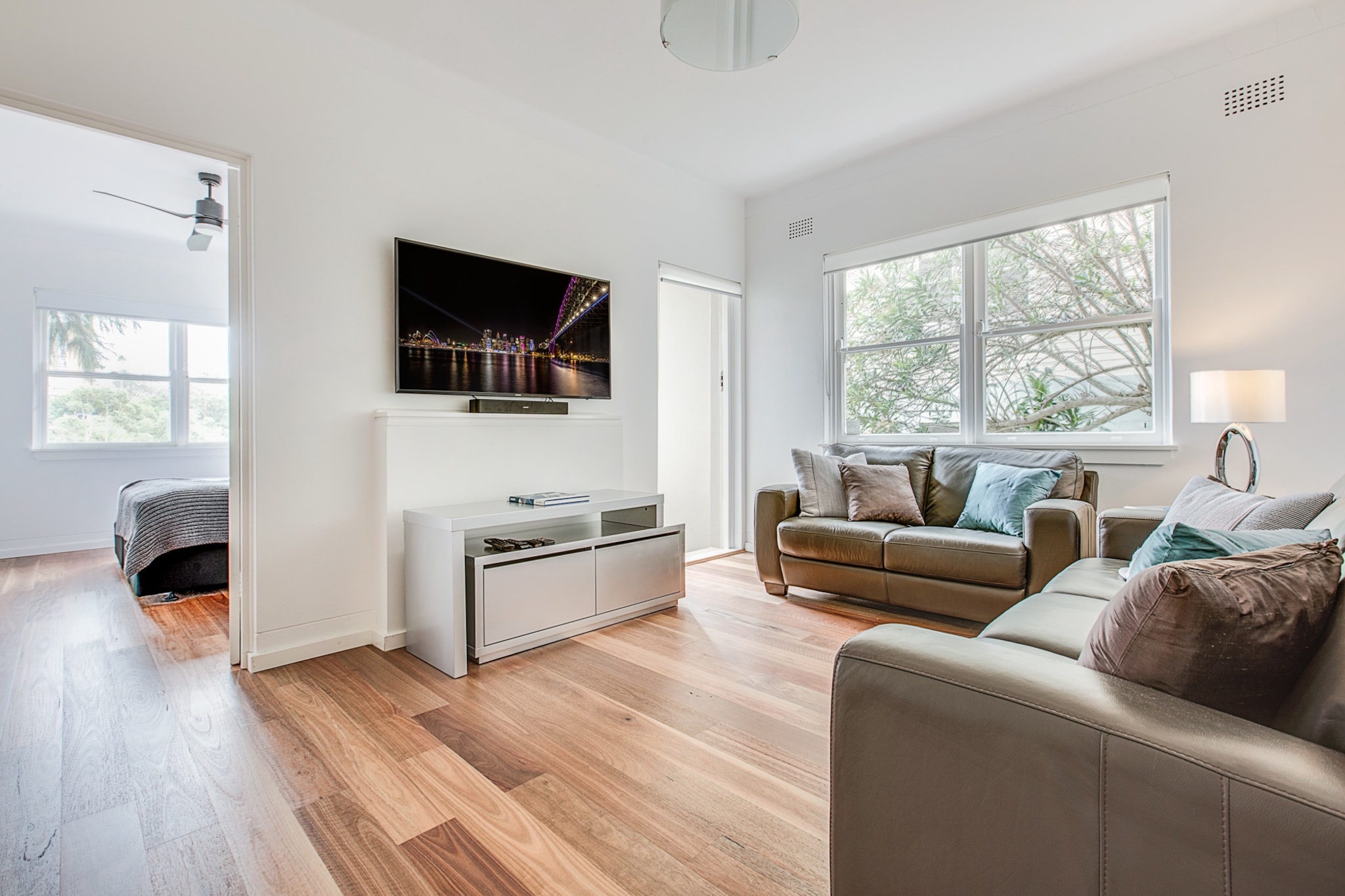 Our spacious and airy ground floor unit is a great base for exploring everything Sydney has to offer. It's tucked away on a quiet street, so it's easy to forget you're only a short bus or ferry ride from the CBD and minutes from countless shops and restaurants. And off-street parking makes exploring North Sydney easy by car (definitely visit the iconic Balmoral Beach). The flat itself is lovely, with art-deco touches, modern conveniences and plenty of space for the whole gang.
The space
• Freshly renovated with period touches
• Modern kitchen, stainless steel appliances, gas stove
• Wi-Fi, heating, Smart TV with Stan and Netflix
• Iron
• Washing Machine
• Designated parking spot
• Minutes to public transport
• Perfect for families
• 200m to Woolworths supermarket and restaurants
Local area description
Sydney is defined by its harbour, and you never feel that more than in Neutral Bay. The only thing separating the suburb from the city is water. The monumental architecture of the Harbour Bridge is ever-present; mid-century houses and apartments compete for space on twisting, leafy streets. Its location makes it a favourite of young professionals, families, and anyone who wants to be close to the action.
House rules
You are staying in a friendly and peaceful neighbourhood and we kindly ask you to respect the community and your surrounding neighbours. The following strict House Rules apply:
- No loud noise between 10 pm and 8 am
- No parties or antisocial behaviour
- No additional people are to access the property without our prior approval
- No pets are allowed in the property without approval
- No smoking is allowed at any times
- If you break something, please let us know
- To help protect all floor coverings do not wear any shoes inside the property
Please be aware that excessive noise such as amplified music, vocals or screaming or anti-social behaviour in the property or common areas can cause neighbours to complain to us, the Building Manager, Council Rangers or Police.
IMPORTANT: Any breach of the House Rules may lead to a $500 fine plus compensation for any cost/damage created and immediate eviction of the property.
Finally, when checking out, we kindly ask you for the following:
- Please leave all beds unmade
- Please clean up your dishes and put them away
- In case you have rearranged furniture, please put it back to the original location
- Please take out the rubbish and remember to use the right bins
- Please ensure all appliances, A/C and lights are off and doors and windows are closed
Interaction with guests
Welcome to MadeComfy! Our local team curates stays in exceptional Australian & New Zealand properties, ensuring style, comfort, and prime locations for discerning guests. We prioritise your needs to provide a memorable home-away-from-home experience. Explore our digital guidebooks for local recommendations, and don't hesitate to contact us throughout your stay. We're here to ensure your comfort – enjoy your stay with MadeComfy.
Notes
For your comfort, this property is prepared with professional-grade hotel-style linen, including a three-sheet setup, ensuring a fresh and hygienic sleep experience.
Extra Services:
- Early check-in: Our standard check-in is at 3 pm. To guarantee early access to the property we suggest booking the night before if available. Otherwise, early check-in is subject to availability from the night before at an additional cost.
- Late check-out: Our standard check-out is at 10 am. To guarantee a later check-out of the property we suggest booking an additional night if available. Otherwise, a late check-out is subject to availability from the night before to an additional cost.
- Baggage: For security reasons, we are unable to receive or to keep unattended baggage before check-in or after check-out
- We provide a small welcome amenity pack to get your stay started
- This booking is protected with coverage for lost baggage and emergency medical expenses, provided by Travel Support with claim upto 500 AUD (T&C Applies). For more details reach out to Guest Support team post booking.
Access description
You’ll have access to the entire property when you stay here, so it will feel like your own home.
Getting around
Buses to the city on Military Road. Catch the ferry from Neutral Bay Wharf: the best free sightseeing tour in the world.
We highly recommend using ride sharing service Uber.
Check out the TripGo app for transport timetables.