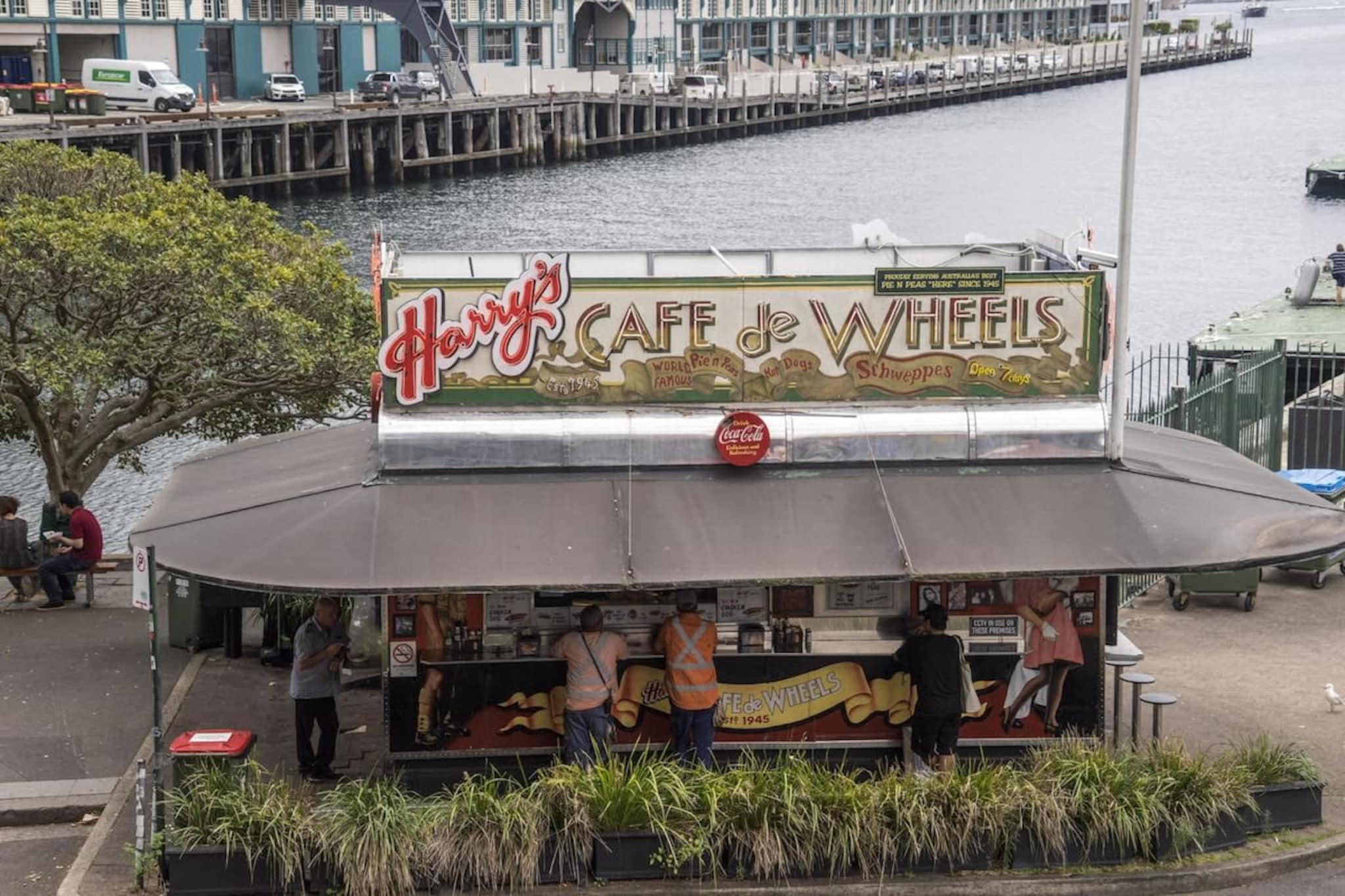 This generously sized studio's location is hard to beat: it's literally across the road from the harbour. Unlike many other studios, this has a full kitchen, a decently sized bathroom and even a Queen-size bed. But you won't want to stay inside admiring the water views for long. An extended lunch in the sun on the wharf out front is a must-do Sydney activity, as is a swim at the Andrew Boy Charlton Pool. And when you want to go into the city for sightseeing you can simply stroll up the hill.
The space
This tidy second floor studio looks directly out onto Sydney Harbour and Woolloomooloo's famous finger wharves. It's a large for a studio, with two beds, a proper kitchen and a well-sized bathroom.
 
General
- Views of the harbour and finger wharves
- Balcony overlooking Sydney Harbour
- Fans and heaters provided
- Laundry facilities provided - Washer and Dryer in the apartment
- Hotel-quality sheets and towels
- Wi-Fi provided
 
Studio
- Comfortable sofa that converts to queen bed
- Flat-screen TV
- Reading nook
 
Bathroom
- Clean, tiled bathroom with tub
- Hair dryer and travel essentials
 
Kitchen
- Full-size kitchen with electric cooktop
- Stone benches
- Coffee machine
- Modern appliances
Local area description
It might not be the easiest neighbourhood to spell, but Woolloomooloo is a great place to stay. Bordering the city's eastern fringe, it was once a rough and tumble area that played host to wharfies and sailors. These days it's better known for its top-notch restaurants, boutique shops and celebrity spotting.
House rules
You are staying in a friendly and peaceful neighbourhood and we kindly ask you to respect the community and your surrounding neighbours. The following strict House Rules apply:
 
 
 
- No loud noise between 10 pm and 8 am
- No parties or antisocial behaviour
- No additional people are to access the property without our prior approval
- No pets are allowed in the property without approval
- No smoking is allowed at any times
- If you break something, please let us know
 
- To help protect all floor coverings do not wear any shoes inside the property
 
 
Please be aware that excessive noise such as amplified music, vocals or screaming or anti-social behaviour in the property or common areas can cause neighbours to complain to us, the Building Manager, Council Rangers or Police.
 
 
IMPORTANT: Any breach of the House Rules may lead to a $500 fine plus compensation for any cost/damage created and immediate eviction of the property.
 
 
Finally, when checking out, we kindly ask you for the following:
 
 
 
- Please leave all beds unmade
- Please clean up your dishes and put them away
- In case you have rearranged furniture, please put it back to the original location
- Please take out the rubbish and remember to use the right bins
- Please ensure all appliances, A/C and lights are off and doors and windows are closed
Interaction with guests
Welcome to MadeComfy! Our local team curates stays in exceptional Australian & New Zealand properties, ensuring style, comfort, and prime locations for discerning guests. We prioritise your needs to provide a memorable home-away-from-home experience. Explore our digital guidebooks for local recommendations, and don't hesitate to contact us throughout your stay. We're here to ensure your comfort – enjoy your stay with MadeComfy.
Notes
- For your comfort, this property is prepared with professional-grade hotel-style linen, including a three-sheet setup, ensuring a fresh and hygienic sleep experience.
- There is no AC in the property.
- Noise in the area may be heightened at times.
Extra Services:
- Early check-in: Our standard check-in is at 3 pm. To guarantee early access to the property we suggest booking the night before if available. Otherwise, early check-in is subject to availability from the night before at an additional cost.
- Late check-out: Our standard check-out is at 10 am. To guarantee a later check-out of the property we suggest booking an additional night if available. Otherwise, a late check-out is subject to availability from the night before to an additional cost.
- Baggage: For security reasons, we are unable to receive or to keep unattended baggage before check-in or after check-out
- We provide a small welcome amenity pack to get your stay started
- As part of one of the most popular suburbs in Sydney CBD, there is lively activity in the neighbourhood due to the restaurants and shops, some noise is expected
- This booking is protected with coverage for lost baggage and emergency medical expenses, provided by Travel Support with claim upto 500 AUD (T&C Applies). For more details reach out to Guest Support team post booking.
Access description
You’ll have access to the entire property when you stay here, so it will feel like your own home.
 
- Key collection is offsite, 1.2 Kilometers from the property and not available 24/7. Further details will be provided 3 days before check-in if your booking is successfully reserved.
Getting around
It's a 10-minute walk to the city, but the 311 bus leaves around the corner.
 
I highly recommend using ride-sharing services: For first time users, download the Uber app for more information.
 
Check out the TripGo app for transport timetables.