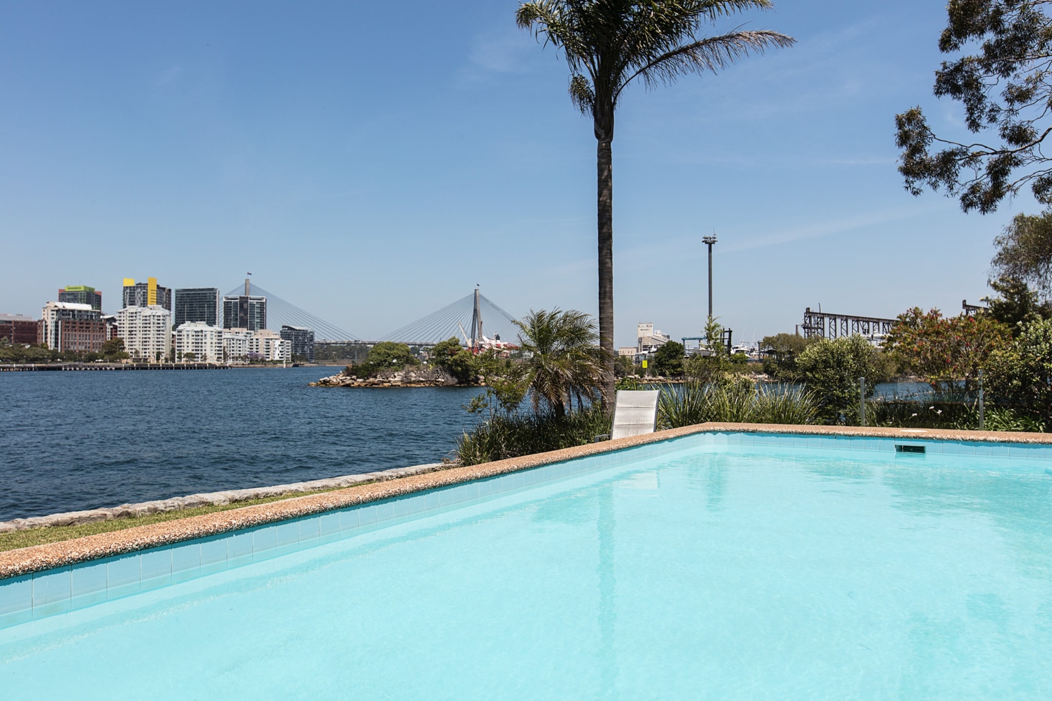 Bed Linen, Desk, Elevator, Hot Water, Internet Access DSL, Wardrobe, Living room(TV, seating area), Kitchen(electric kettle, toaster, oven, microwave, dishwasher, fridge), bedroom(2x single bed), bedroom(Queen Bed), bathroom(shower, washbasin, toilet, hairdryer, Towels/Sheets (Incl.), shampoo, body soap, Essentials, Conditioner, Shower gel), First Aid, Play area, tumble dryer, cot, washing machine, balcony or terrace, swimming pool, private outdoor pool, iron, Dedicated workspace, Long term stays allowed, Wine glasses