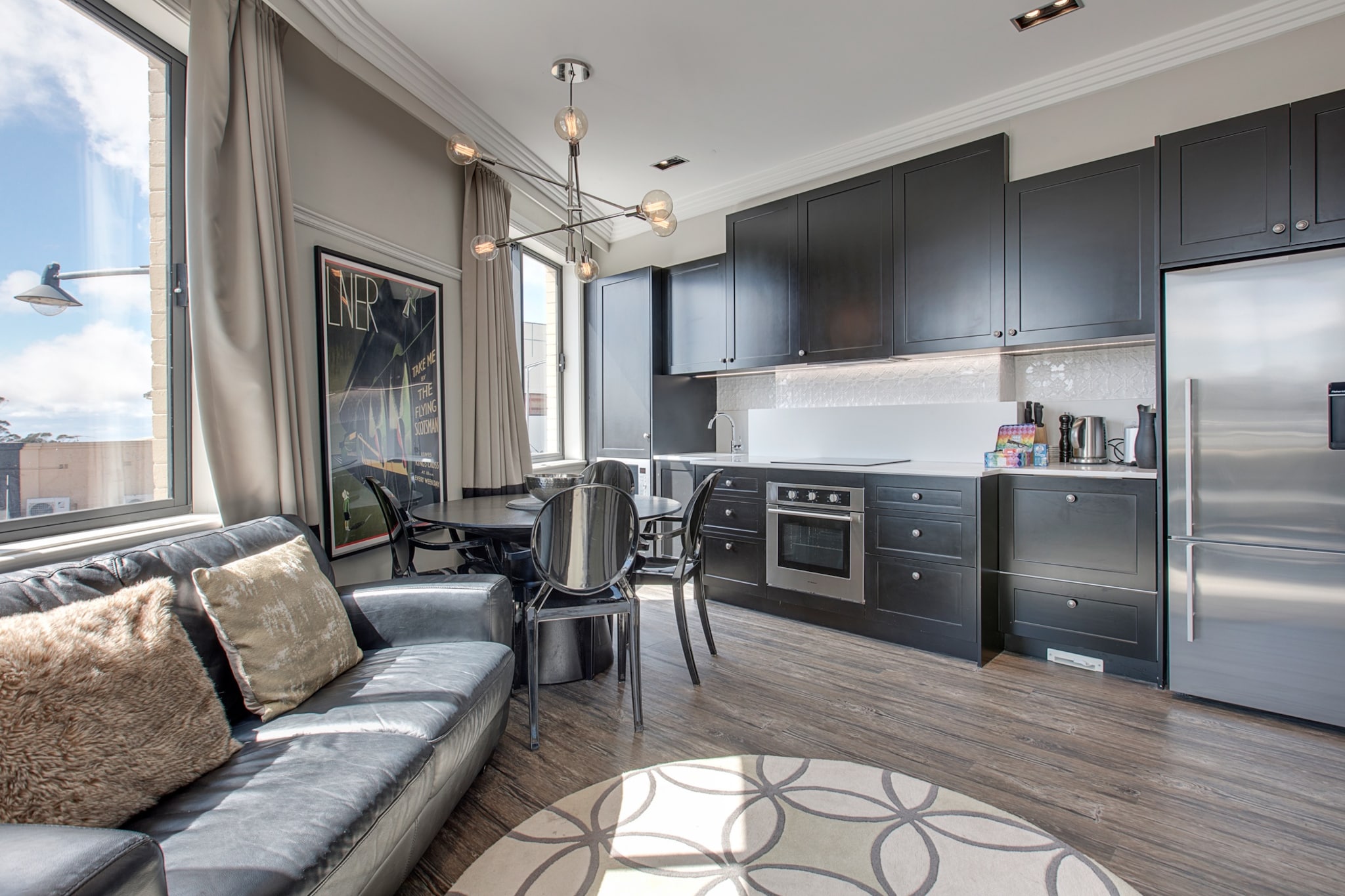 The Blue Mountains are a great destination in every season. In winter, our new two bedroom apartment is the perfect place to rug up and get cosy, thanks to high-end bedding and a lovely fireplace, as well as the inviting teahouses and traditional pubs just around the corner. In summer, autumn and spring, it's ideal for launching bushwalking expeditions or exploring other mountain towns. Just hop on the train across the road and you can be in Leura, Wentworth Falls or Blackheath in minutes.
The space
Recently constructed and filled with natural light, this two bedroom apartment is the perfect place to stay, no matter the season.
 
General
- Brand new building with high quality finishes
- Right in the heart of Katoomba's shopping strip
- Ducted air conditioning and heating
- Common laundry facilities provided
- Wi-Fi provided
- Self check-in
 
Living room
- Flat-screen TV
- Comfy leather lounge
- Sound bar and fireplace
 
Bathroom
- Luxury tiled bathroom
- Hair dryer
 
Bedroom 1
- One king bed
- Built-in wardrobes
- Ensuite Bathroom
 
Bedroom 2
- One queen bed
- Built-in wardrobes
 
Kitchen
- Electric cooktop
- Modern stainless-steel appliances
- Dishwasher
Local area description
Katoomba is the classic Blue Mountains town. Perched high above Sydney in the middle of the Blue Mountains National Park, it's the jumping off point for some of the area's most iconic attractions: Scenic World, the Three Sisters and Echo Point. Beyond the natural beauty, it's almost impossibly cute, with more than enough beautiful sandstone buildings, art deco cafes, gardens, pubs and boutique shops to keep you busy.
House rules
You are staying in a friendly and peaceful neighbourhood and we kindly ask you to respect the community and your surrounding neighbours. The following strict House Rules apply:
- No loud noise between 10 pm and 8 am
- No parties or antisocial behaviour
- No additional people are to access the property without our prior approval
- No pets are allowed in the property without approval
- No smoking is allowed at any times
- If you break something, please let us know
- To help protect all floor coverings do not wear any shoes inside the property
- This property is equipped with an automatic fire alarm system. In the event of an unintentional activation, please be advised that you may be held liable for any associated call-out charges incurred.
 
Please be aware that excessive noise such as amplified music, vocals or screaming or anti-social behaviour in the property or common areas can cause neighbours to complain to us, the Building Manager, Council Rangers or Police.
 
IMPORTANT: Any breach of the House Rules may lead to a $500 fine plus compensation for any cost/damage created and immediate eviction of the property.
 
Finally, when checking out, we kindly ask you for the following:
- Please leave all beds unmade
- Please clean up your dishes and put them away
- In case you have rearranged furniture, please put it back to the original location
- Please take out the rubbish and remember to use the right bins
- Please ensure all appliances, A/C and lights are off and doors and windows are closed
Interaction with guests
Welcome to MadeComfy! Our local team curates stays in exceptional Australian & New Zealand properties, ensuring style, comfort, and prime locations for discerning guests. We prioritise your needs to provide a memorable home-away-from-home experience. Explore our digital guidebooks for local recommendations, and don't hesitate to contact us throughout your stay. We're here to ensure your comfort – enjoy your stay with MadeComfy.
Notes
For your comfort, this property is prepared with professional-grade hotel-style linen, including a three-sheet setup, ensuring a fresh and hygienic sleep experience.
 
Extra Services:
- Early check-in: Our standard check-in is at 3 pm. To guarantee early access to the property we suggest booking the night before if available. Otherwise, early check-in is subject to availability from the night before at an additional cost.
- Late check-out: Our standard check-out is at 10 am. To guarantee a later check-out of the property we suggest booking an additional night if available. Otherwise, a late check-out is subject to availability from the night before to an additional cost.
- Baggage: For security reasons, we are unable to receive or to keep unattended baggage before check-in or after check-out
- We provide a small welcome amenity pack to get your stay started
 
Note
- 15 steps from street level to apartment
- This booking is protected with coverage for lost baggage and emergency medical expenses, provided by Travel Support with claim upto 500 AUD (T&C Applies). For more details reach out to Guest Support team post booking.
Access description
You’ll have access to the entire property when you stay here, so it will feel like your own home.
- The keys will be left onsite. We will send you the access code 3 days prior to your arrival.
Getting around
Two minutes' walk to Katoomba Train Station. Trains leave regularly to Sydney and take two hours to Central Station. You can also catch the train to other towns in the Blue Mountains.
 
We highly recommend using ride sharing service Uber.
 
Check out the TripGo app for transport timetables.