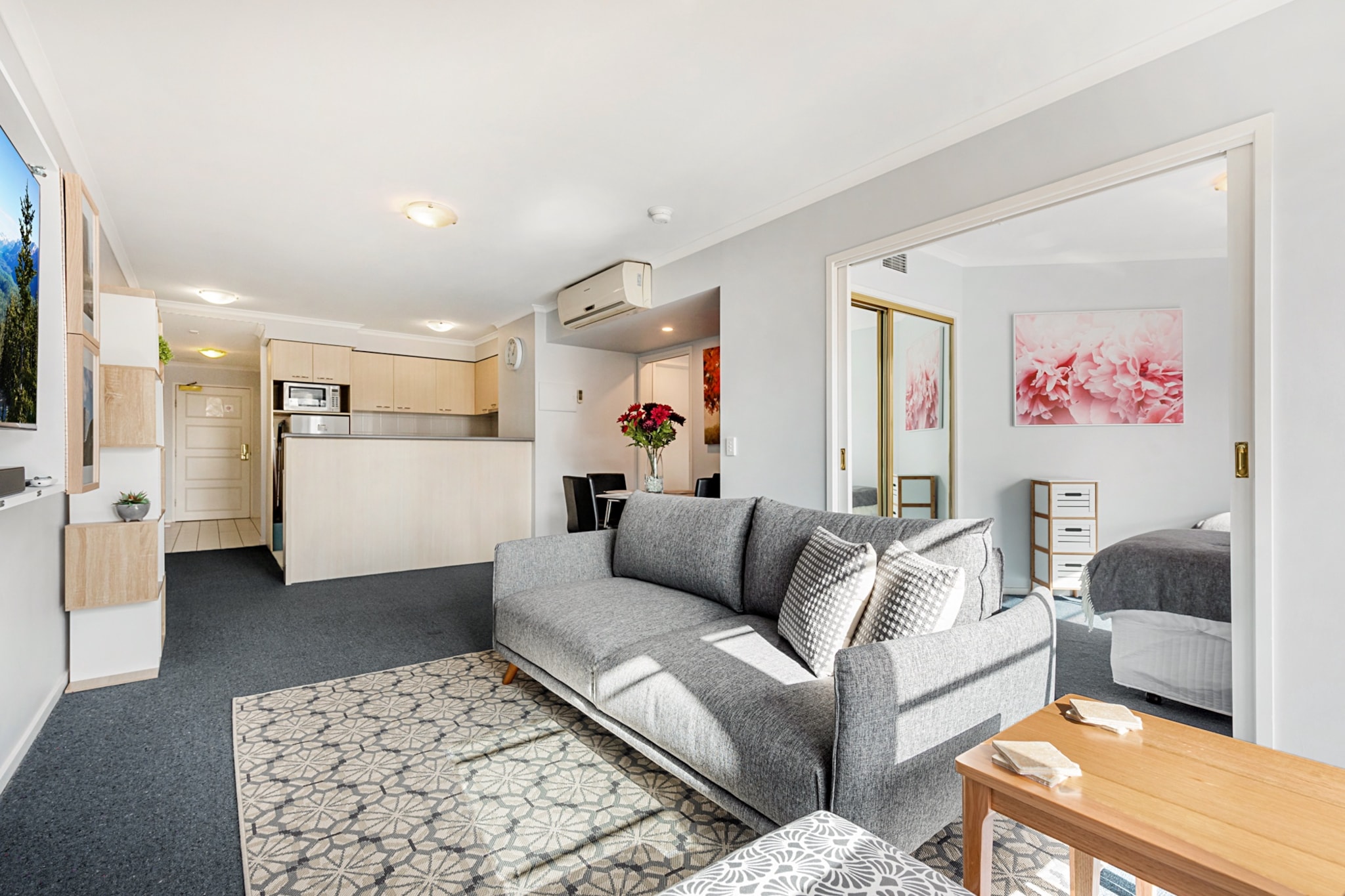 This spacious unit has a prime location with short walks or free trams to all of the Melbourne CBDâ€™s world-famous attractions, malls and dining hubs. Itâ€™s also well-connected to Melbourneâ€™s beaches and stadiums via trains from Southern Cross Station across the road. The unit captures city views from both bedrooms and its private balcony. It also has a study nook, separate toilet, well-equipped kitchen and comfortable living and dining. The unit has access to a free parking.
The space
This is a spacious apartment with carpet in the living areas and bedrooms, as well as picture-frame windows capturing city views. One bedroom has two single beds, while the other has a queen-size bed and study nook. The living room has a three-person sofa, an occasional chair and adjoining balcony. Thereâ€™s also four-person dining and a large kitchen with convenient appliances. The bathroom has a separate toilet and laundry
 
General
- Entire 2-bedroom, 1-bathroom apartment
- Laundry facilities provided
- Wi-Fi provided
- Secure undercover parking
- Balcony
 
Living room
- Flat-screen TV with Netflix, Disney+ and Stan
- Google TV
- Sofas
- Dining table
- Coffee table
 
Bedrooms and bathrooms
- Bedroom 1: Queen-size bed, built-in wardrobe, blackout blinds, study nook
- Bedroom 2: 2 single beds, built-in wardrobe, blackout blinds
- Bathroom with shower bath and separate toilet
- Top quality linens & towels
 
Kitchen
- Stainless-steel appliances
- Electric oven and stovetop with rangehood
- Dishwasher, toaster, microwave, coffee machine and kettle
- Fridge and freezer
 
Laundry
- Iron and ironing board
- Washing machine and dryer
- Clothes drying rack