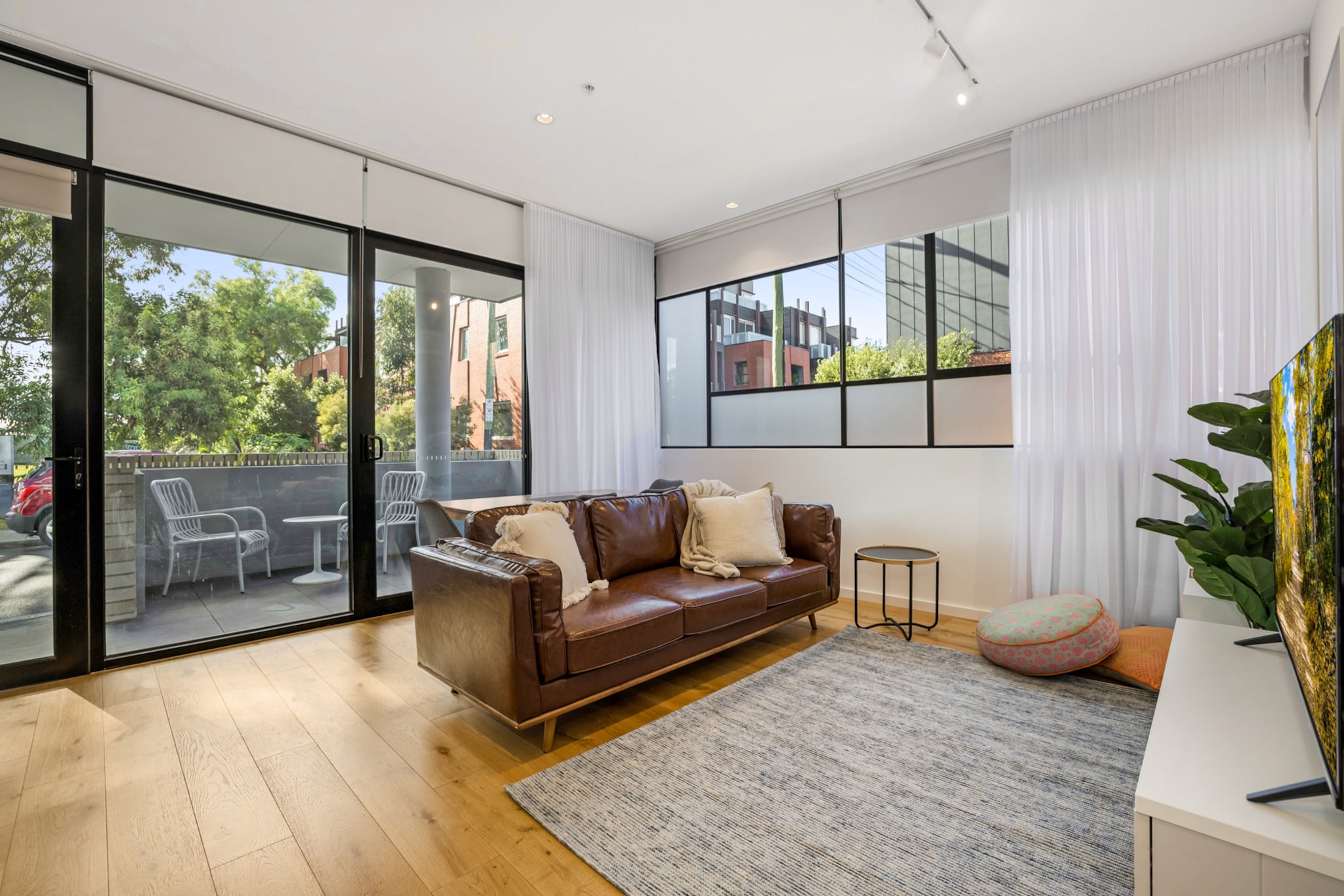 This two-bedroom, one-bathroom apartment has a sought-after location just off Chapel Street, where you’ll find numerous bars, restaurants, cafes and boutiques. You’re never far from parks, theatres and sporting facilities. It also has secure parking and easy access to trains and trams, which makes accessing St Kilda and the Melbourne CBD a breeze. Relax in the light-filled dining and living room, prepare meals in the sleek, open kitchen and enjoy drinks out on the front terrace.
The space
This is a ground-floor apartment with excellent living space. The main entry is off a furnished terrace overlooking the street. It leads into a living and dining room with a four-person table, comfy seating and natural light. The adjacent kitchen has upmarket appliances. A long hallway leads down to the two bedrooms, including one with king-size bedding. They share a modern bathroom. There’s also a full laundry, beautiful timber flooring and ample storage space.
 
General
- Entire 2-bedroom, 1-bathroom apartment
- Private furnished terrace
- Air conditioning
- Laundry facilities provided
- Wi-Fi provided
- Secure undercover parking
 
Living room
- Flat-screen TV
- Sofa
- Coffee table
- Dining table
- Air conditioning
 
Bedrooms and bathrooms
- Bedroom 1: King-size bed, built-in wardrobe, blackout blinds
- Bedroom 2: Queen-size bed, built-in wardrobe, blackout blinds
- Bathroom with rain shower and hairdryer
- Top quality linens & towels
 
Kitchen
- Stainless-steel Smeg appliances
- Electric oven and gas stovetop with rangehood
- Dishwasher
- Toaster, coffee machine, microwave and kettle
- Large fridge and freezer
 
Laundry
- Iron and ironing board
- Washing machine and dryer
- Clothes drying rack
 
Points of Interest
- James Park; opposite the property
- Restaurants; Hawker Hall, Mr Miyagi- 1 minute walk
- Alma Park West 0.7Km, ten-minutes walk
- Red Stitch Actors' Theatre 0.5Km, seven-minutes walk
- MCG Arena 5.6km, 15-minutes drive
- Astor Theatre 450m, 6-minutes walk
- Jewish Museum 1.4Km, 18-minutes walk or three-minutes drive
 
Beach Access
- Port Melbourne Beach 5.5Km, 15-minutes drive
- St Kilda Beach 3.5Km, 15-minutes drive
 
Airport Access
- Melbourne Airport 30Km, 35-minutes drive
- Avalon Airport 59.5Km, 55-minutes drive
Local area description
Windsor is a lively inner suburb about five kilometres from the Melbourne CBD. It has become a trendy place to hangout thanks to its eclectic mix of boutiques, gastro pubs, Asian eateries and vintage stores. Within this cultural enclave you’ll also find the revered Astor Theatre, antique stores and thrift shops along southern Chapel Street and various beer gardens. It also offers convenient access to the beaches and attractions in St Kilda.
House rules
You are staying in a friendly and peaceful neighbourhood and we kindly ask you to respect the community and your surrounding neighbours. The following strict House Rules apply:
 
- No loud noise between 10 pm and 8 am
- No parties or antisocial behaviour
- No additional people are to access the property without our prior approval
- No pets are allowed in the property without approval
- No smoking is allowed at any times
- If you break something, please let us know
 
- To help protect all floor coverings do not wear any shoes inside the property
 
Please be aware that excessive noise such as amplified music, vocals or screaming or anti-social behaviour in the property or common areas can cause neighbours to complain to us, the Building Manager, Council Rangers or Police.
 
IMPORTANT: Any breach of the House Rules may lead to a $500 fine plus compensation for any cost/damage created and immediate eviction of the property.
 
Finally, when checking out, we kindly ask you for the following:
 
- Please leave all beds unmade
- Please clean up your dishes and put them away
- In case you have rearranged furniture, please put it back to the original location
- Please take out the rubbish and remember to use the right bins
- Please ensure all appliances, A/C and lights are off and doors and windows are closed
Interaction with guests
Welcome to MadeComfy! Our local team curates stays in exceptional Australian & New Zealand properties, ensuring style, comfort, and prime locations for discerning guests. We prioritise your needs to provide a memorable home-away-from-home experience. Explore our digital guidebooks for local recommendations, and don't hesitate to contact us throughout your stay. We're here to ensure your comfort – enjoy your stay with MadeComfy.
Notes
For your comfort, this property is prepared with professional-grade hotel-style linen, including a three-sheet setup, ensuring a fresh and hygienic sleep experience.
 
Extra Services:
- Early check-in: Our standard check-in is at 3 pm. To guarantee early access to the property we suggest booking the night before if available. Otherwise, early check-in is subject to availability from the night before at an additional cost.
- Late check-out: Our standard check-out is at 10 am. To guarantee a later check-out of the property we suggest booking an additional night if available. Otherwise, a late check-out is subject to availability from the night before to an additional cost.
- Baggage: For security reasons, we are unable to receive or to keep unattended baggage before check-in or after check-out
- We provide a small welcome amenity pack to get your stay started
 
Note
- Air conditioning in living room only
- The parking garage has a vehicle height restriction of 2m
- Some noise occasionally from Chapel Street
- This booking is protected with coverage for lost baggage and emergency medical expenses, provided by Travel Support with claim upto 500 AUD (T&C Applies). For more details reach out to Guest Support team post booking.
Access description
You’ll have access to the entire property when you stay here, so it will feel like your own home.
Getting around
We highly recommend using ride-sharing services.
 
Check out the TripGo app for transport timetables.
 
Public transport
The High St/Chapel St tram station is about 400 metres away and has regular services to the Melbourne CBD in about 35 minutes. Windsor Station is about 350 metres away and has trains to the CBD in about 10 minutes.
 
Ride sharing
Ride sharing apps are a safe and easy way to get around, especially late at night when public transport services are less frequent. Prices are about two-thirds of a taxi, but may surge during bad weather or public events.
 
Points of Interest
- James Park; opposite the property
- Restaurants; Hawker Hall, Mr Miyagi- 1 minute walk
- Alma Park West 0.7Km, ten-minutes walk
- Red Stitch Actors' Theatre 0.5Km, seven-minutes walk
- MCG Arena 5.6km, 15-minutes drive
- Astor Theatre 450m, 6-minutes walk
- Jewish Museum 1.4Km, 18-minutes walk or three-minutes drive
 
Beach Access
- Port Melbourne Beach 5.5Km, 15-minutes drive
- St Kilda Beach 3.5Km, 15-minutes drive
 
Airport Access
- Melbourne Airport 30Km, 35-minutes drive
- Avalon Airport 59.5Km, 55-minutes drive