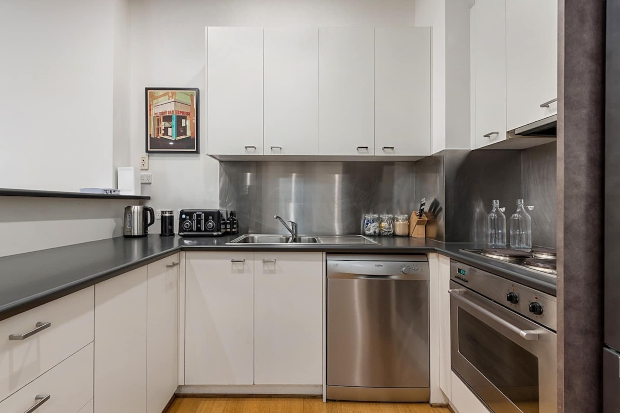 This is a gorgeous apartment with 2 parking spaces in a distinctive boutique block of 12 apartments in the heart of Collingwood’s dining and shopping hub, close to tram stops and train station. It has 2 bedrooms and 1 bathroom with wonderfully styled open-plan living and dining areas. The well-equipped kitchen and the furnished balcony is ideal for morning coffee or sundowner. Outside, you’ll find cosmopolitan dining, cafes, and bars close by along Smith Street within a walking distance.
The space
This apartment is spread across two floors. The two bedrooms and bathroom are located on the first level, adorned with soft carpet and tiles. Upstairs, the open-plan living and dining room and well-equipped kitchen have timber flooring and excellent natural light. The dining room has a six-seat table and reading chair. The private balcony is furnished with outdoor seating.
 
General
- Entire 2-bedroom, 1-bathroom apartment
- Private furnished balcony
- Air conditioning (heating and cooling) in the living room and kitchen
- Laundry facilities provided
- Wi-Fi provided
- Unlimited undercover parking for 2 vehicles
 
Living room
- Flat-screen TV
- Sofa and 3 arm chairs
- Coffee table
- Dining table
- Air conditioning
 
Bedrooms and bathroom
- Bedroom 1: Queen-size bed, blackout blinds, built-in wardrobe, fan, electric heater, dedicated workplace
- Bedroom 2: Queen-size bed, blackout blinds, built-in wardrobe, fan, electric heater
- Newly renovated bathroom (March 2023) with shower and hair dryer
- Top quality linens & towels
 
Kitchen
- Stainless-steel appliances
- Electric oven and stovetop with rangehood
- Dishwasher
- Kettle, coffee machine, toaster and microwave
- Fridge and freezer
 
Laundry
- Iron and ironing board
- Washing machine and dryer
- Clothes drying rack
 
Points of Interest
- Fitzroy and Carlton are within walking distance
- Melbourne CBD- 3km and 10-minute drive
- Carlton Gardens 1.2 Km, 20-minutes walk or four-minutes drive
- Melbourne Museum 1.3 Km, 16-minutes walk or four-minutes drive
- Parliament House 1.6 Km, 21-minutes walk or five-minutes drive
 
Beach Access
- Port Melbourne Beach 8.1 Km, 15-minutes drive
- St Kilda Beach 7.9 Km, 15-minutes drive
 
Airport Access
- Melbourne Airport 23.3 Km, 23-minutes drive
- Avalon Airport 59.7 Km, 49-minutes drive
Local area description
Collingwood has become one of Melbourne’s trendiest neighbourhoods. Old workers’ cottages and warehouses have been converted into come of the city’s most coveted cafes, restaurants, art galleries and boutiques. Collingwood is also renowned for its live music scene, while Smith Street is a bustling strip for late-night dining, lunch dates and vintage shopping.
House rules
You are staying in a friendly and peaceful neighbourhood and we kindly ask you to respect the community and your surrounding neighbours. The following strict House Rules apply:
 
- No loud noise between 10 pm and 8 am
- No parties or antisocial behaviour
- No additional people are to access the property without our prior approval
- No pets are allowed in the property without approval
- No smoking is allowed at any times
- If you break something, please let us know
- To help protect all floor coverings do not wear any shoes inside the property
 
Please be aware that excessive noise such as amplified music, vocals or screaming or anti-social behaviour in the property or common areas can cause neighbours to complain to us, the Building Manager, Council Rangers or Police.
 
IMPORTANT: Any breach of the House Rules may lead to a $500 fine plus compensation for any cost/damage created and immediate eviction of the property.
 
Finally, when checking out, we kindly ask you for the following:
 
- Please leave all beds unmade
- Please clean up your dishes and put them away
- In case you have rearranged furniture, please put it back to the original location
- Please take out the rubbish and remember to use the right bins
- Please ensure all appliances, A/C and lights are off and doors and windows are closed
Interaction with guests
Welcome to MadeComfy! Our local team curates stays in exceptional Australian & New Zealand properties, ensuring style, comfort, and prime locations for discerning guests. We prioritise your needs to provide a memorable home-away-from-home experience. Explore our digital guidebooks for local recommendations, and don't hesitate to contact us throughout your stay. We're here to ensure your comfort – enjoy your stay with MadeComfy.
Notes
For your comfort, this property is prepared with professional-grade hotel-style linen, including a three-sheet setup, ensuring a fresh and hygienic sleep experience.
 
Extra Services:
- Early check-in: Our standard check-in is at 3 pm. To guarantee early access to the property we suggest booking the night before if available. Otherwise, early check-in is subject to availability from the night before at an additional cost.
- Late check-out: Our standard check-out is at 10 am. To guarantee a later check-out of the property we suggest booking an additional night if available. Otherwise, a late check-out is subject to availability from the night before to an additional cost.
- Baggage: For security reasons, we are unable to receive or to keep unattended baggage before check-in or after check-out
- We provide a small welcome amenity pack to get your stay started
- There is no lift at the property. There is one flight of stairs leading to the apartment and one flight of stairs inside the apartment
 
Note
- Air Conditioning (heating and cooling) in the living room and kitchen
- Parking has a vehicle height restriction of 2m
- 10 min from CBD in a car
- This booking is protected with coverage for lost baggage and emergency medical expenses, provided by Travel Support with claim upto 500 AUD (T&C Applies). For more details reach out to Guest Support team post booking.
Access description
You’ll have access to the entire property when you stay here, so it will feel like your own home
Getting around
We highly recommend using ride-sharing services.
 
Check out the TripGo app for transport timetables.
 
Public transport
 
There are multiple tram stops along Smith Street and Johnston Street with regular services into the city centre in about 20 minutes, as well as to the surrounding suburbs. Collingwood Station is about 900 metres away and has trains into the city centre and to the northern suburbs.
 
Ride sharing
Ride sharing apps are a safe and easy way to get around, especially late at night when public transport services are less frequent. Prices are about two-thirds of a taxi, but may surge during bad weather or public events.
 
Points of Interest
- Fitzroy and Carlton arre within walking distance
- Melboune CBD- 3km and 10-minute drive
- Carlton Gardens 1.2 Km, 20-minutes walk or four-minutes drive
- Melbourne Museum 1.3 Km, 16-minutes walk or four-minutes drive
- Parliament House 1.6 Km, 21-minutes walk or five-minutes drive
- Cambridge Street Reserve opposite the property with a playground, seating and reserve for picnics
 
Beach Access
- Port Melbourne Beach 8.1 Km, 15-minutes drive
- St Kilda Beach 7.9 Km, 15-minutes drive
 
Airport Access
- Melbourne Airport 23.3 Km, 23-minutes drive
- Avalon Airport 59.7 Km, 49-minutes drive